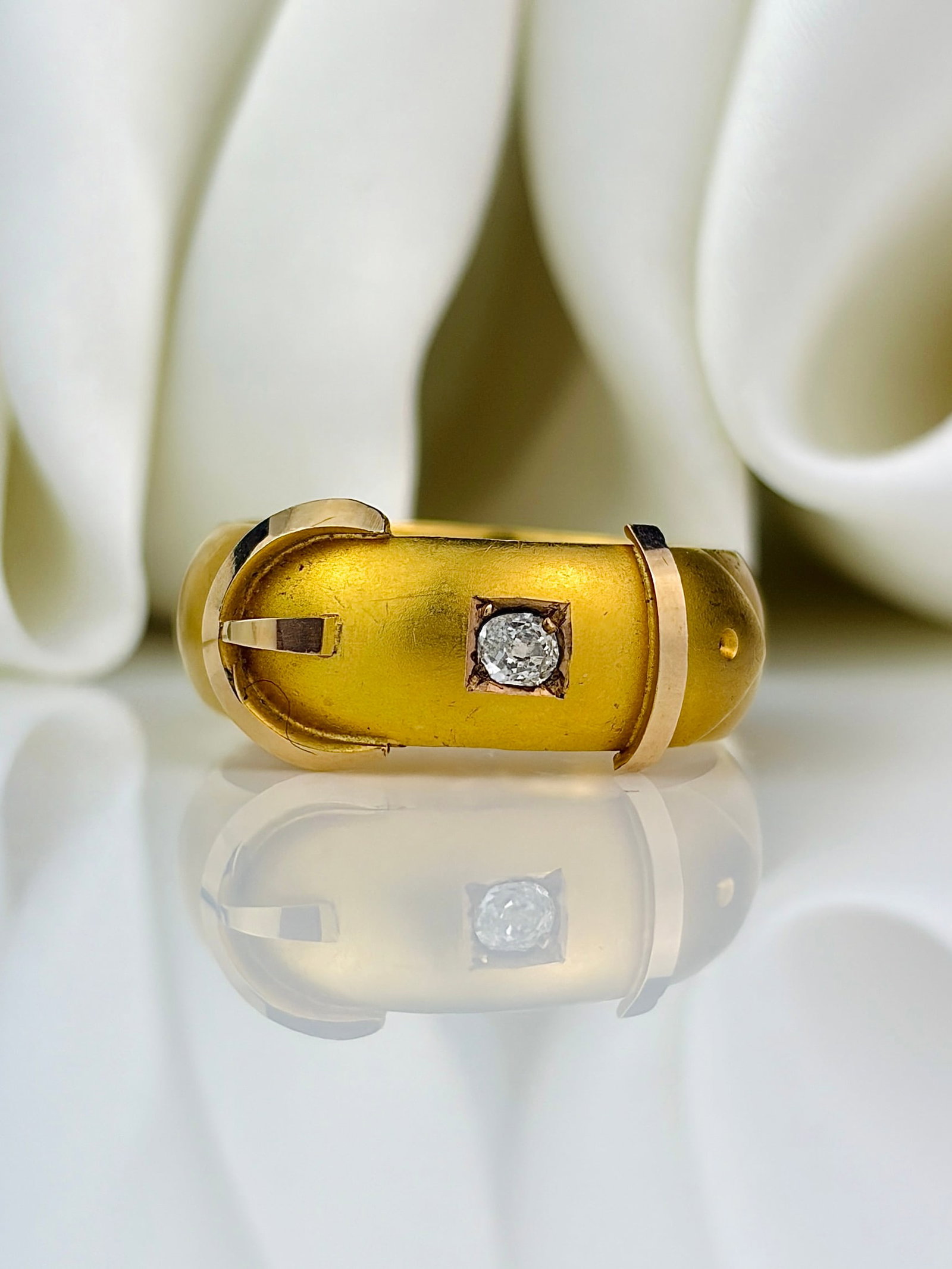 chunky antique 15ct yellow gold diamond buckle ring matte effect: chunky antique 15ct yellow gold diamond buckle ring matte effect Weight: 3.61g Size: UK N, US 7, Width 8mm, height off finger 3mm Materials: 15ct gold Hallmarks: 15ct, Birmingham Condition: The