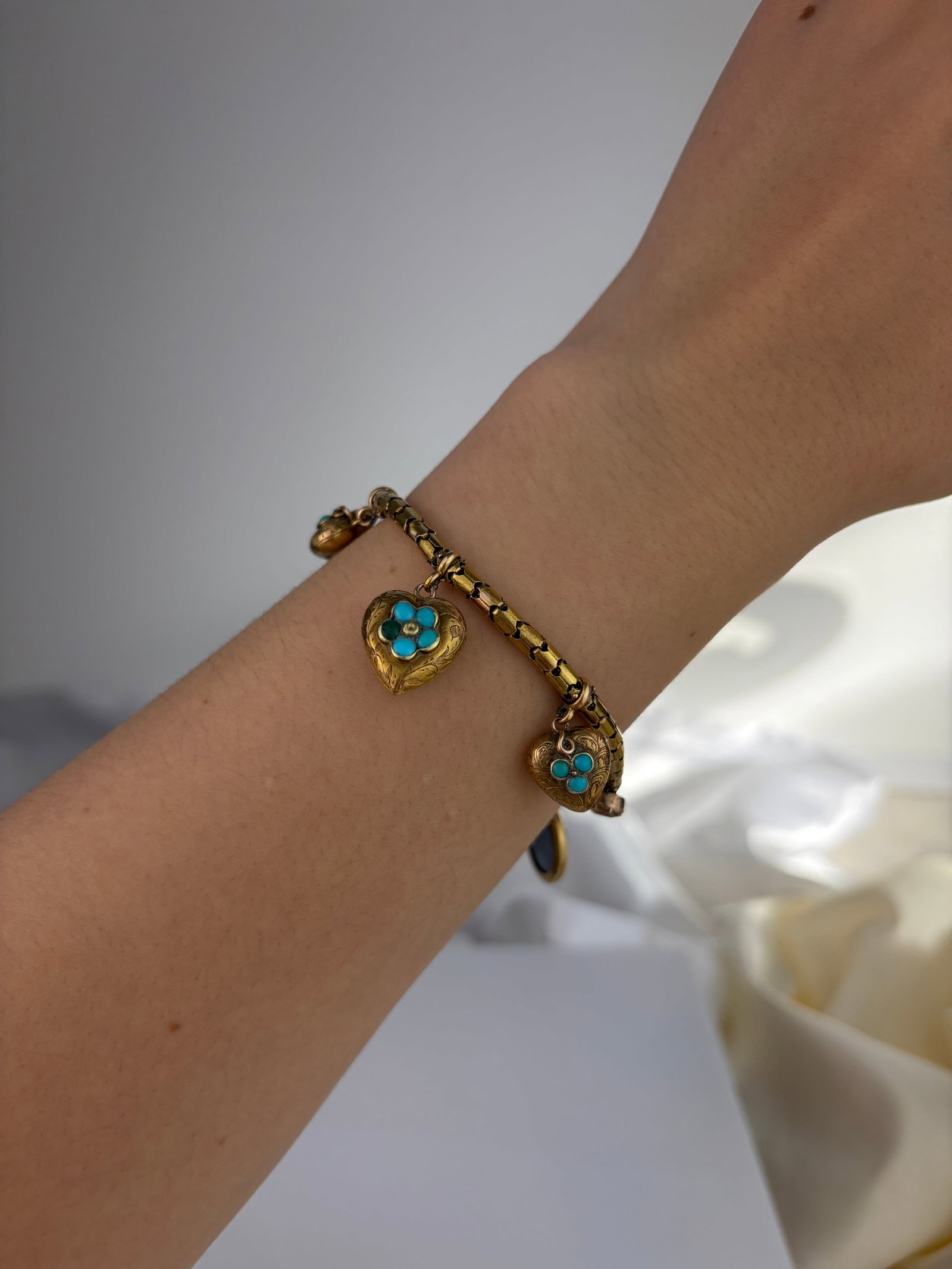 ANTIQUE VICTORIAN 18CT YELLOW GOLD TURQUOISE HEART, AND BLUE ENAMEL AND PEARL CHARM BRACELET - 8