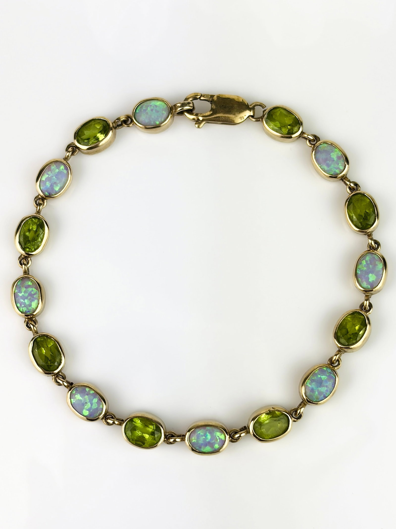 VINTAGE 9CT YELLOW GOLD OPAL AND PERIDOT BRACELET (1 of 9)