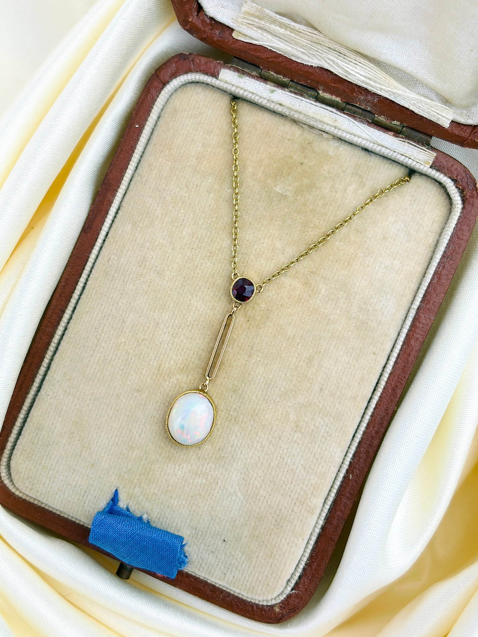 ANTIQUE BOXED OPAL AND RUBY DROP NECKLACE IN 15CT YELLOW GOLD: ANTIQUE BOXED OPAL AND RUBY DROP NECKLACE IN 15CT YELLOW GOLD An elegant necklace, in its original antique box!