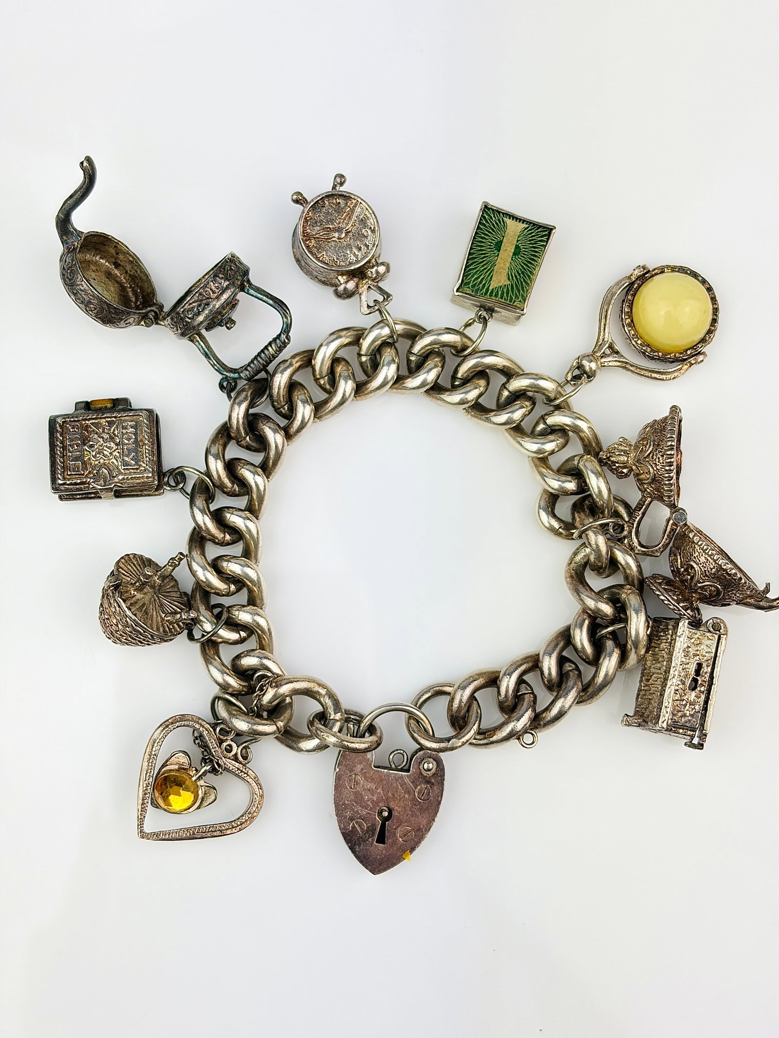 heavy silver charm bracelet with rare opening charms. - very heavy (1 of 6)