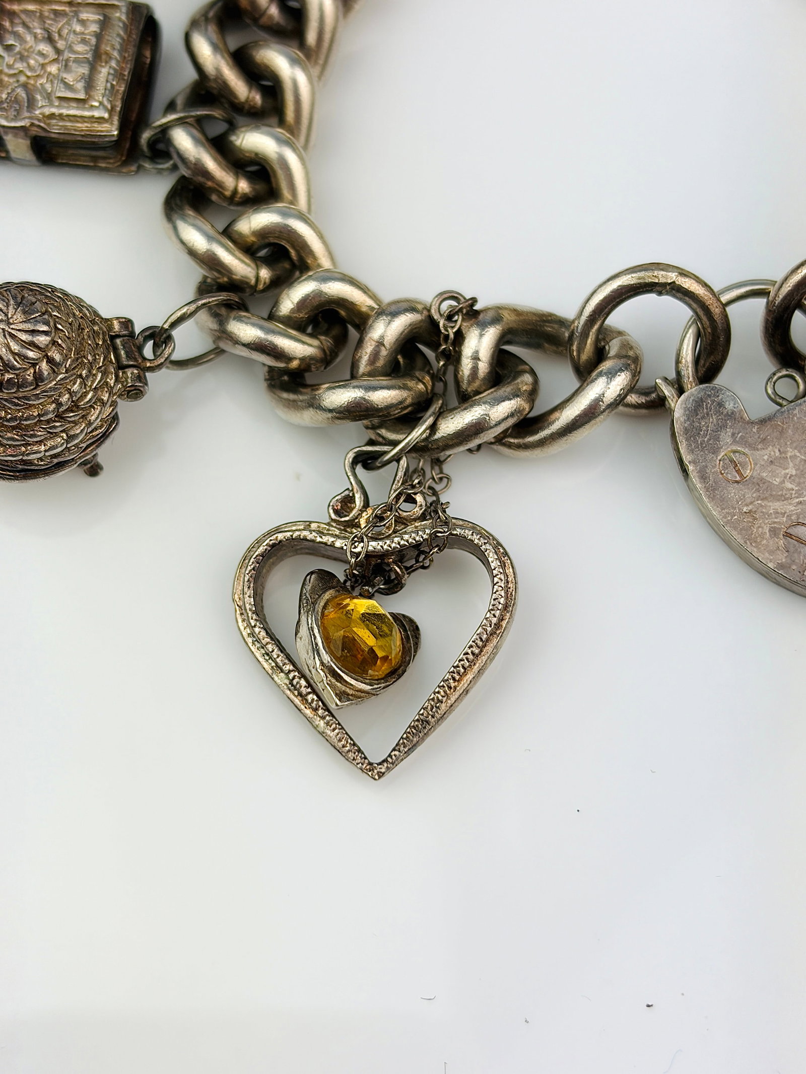heavy silver charm bracelet with rare opening charms. - very heavy - 2