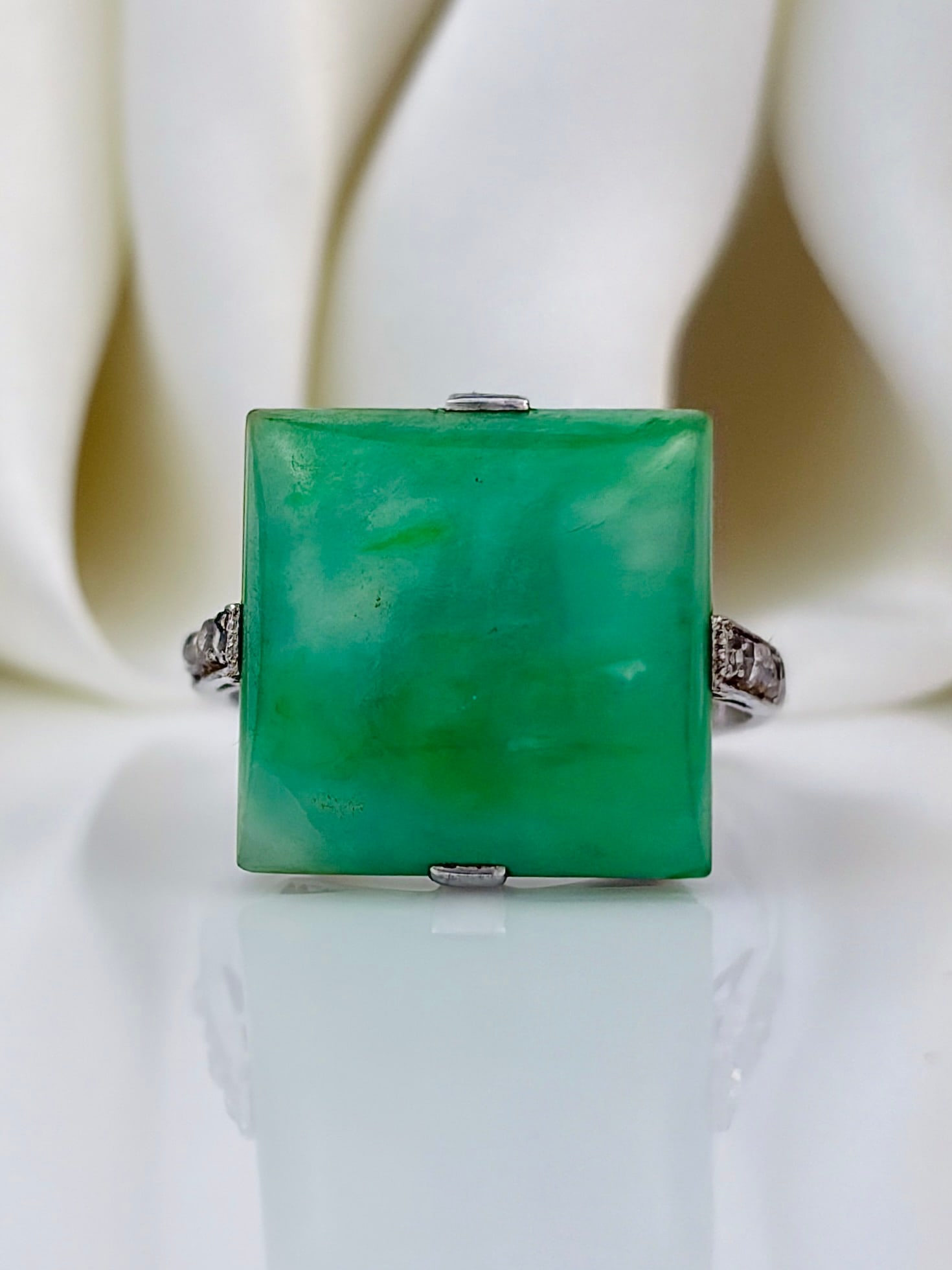 c.1920 Jade, Rose Cut Diamond and 18 Carat White Gold Ring: C.1920 Jade, Rose Cut Diamond and 18 Carat White Gold Ring Amazing bird design on the reverse!! The green stone is smooth and glossy. This ring is modelled in 9carat white gold and has gorgeous rose c