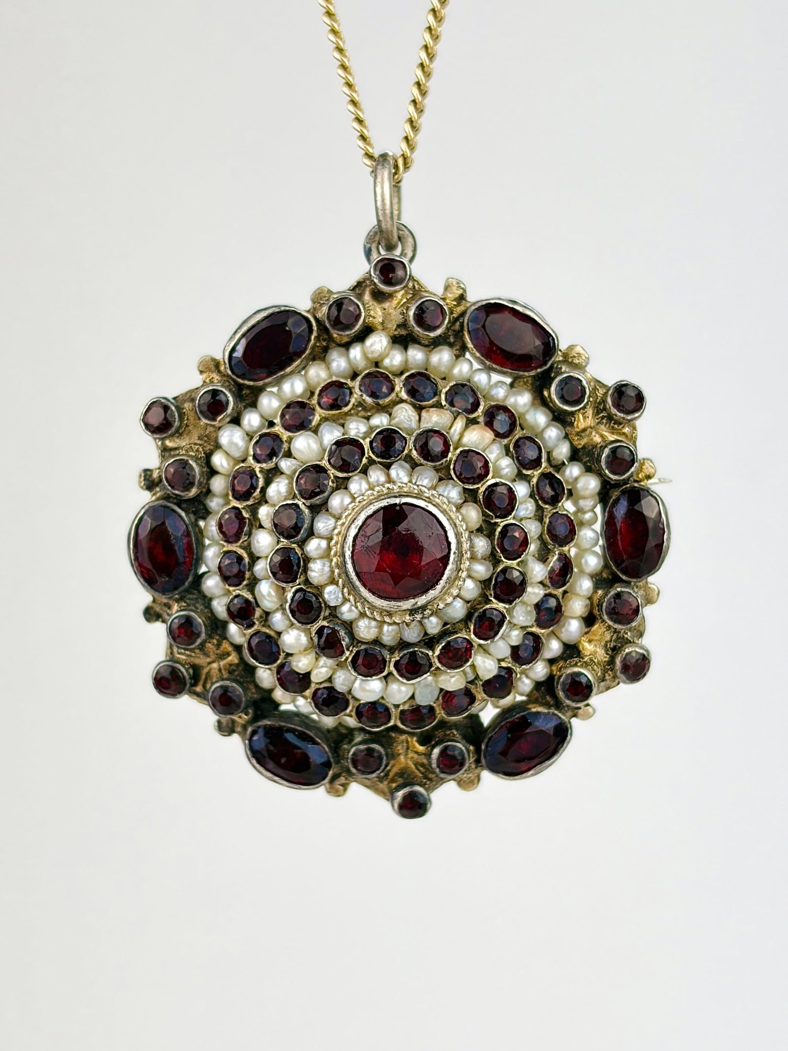 ANTIQUE AUSTRO HUNGARIAN GARNET AND PEARL BROOCH/PENDANT: ANTIQUE AUSTRO HUNGARIAN GARNET AND PEARL BROOCH/PENDANT Stunning pendant! Chain not included. 