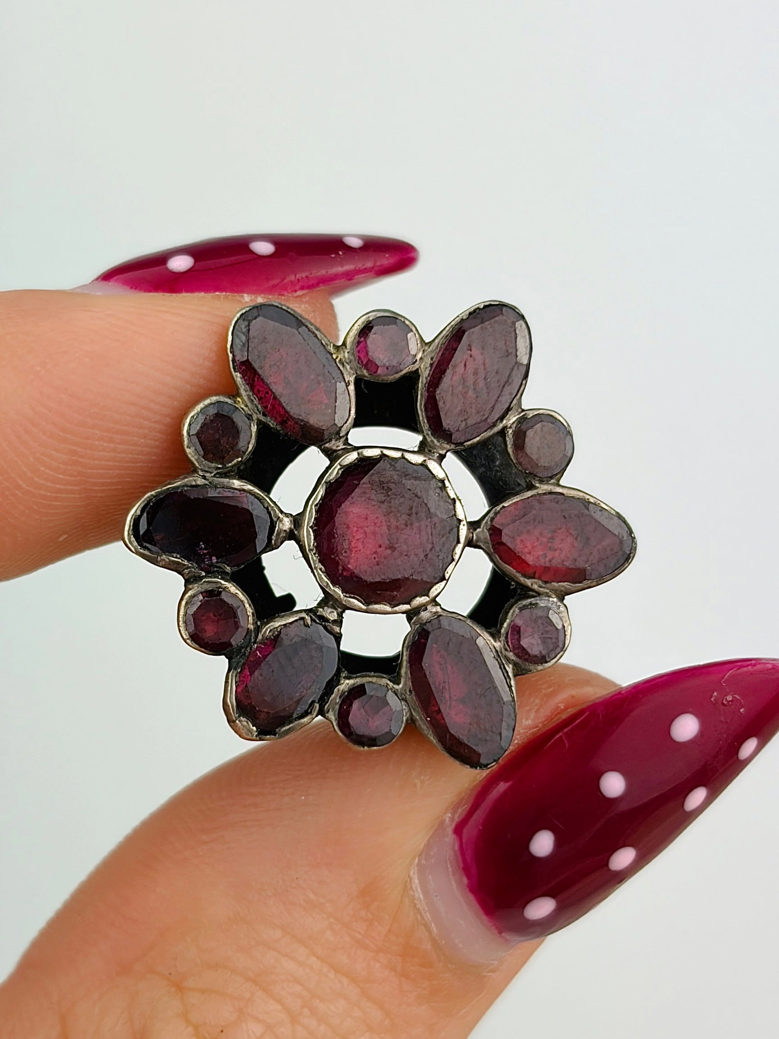 ANTIQUE SILVER AND FLAT CUT GARNET COMPONENT: ANTIQUE SILVER AND FLAT CUT GARNET COMPONENT