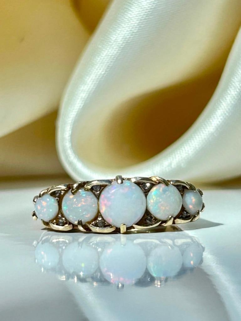 Chunky 18ct Yellow Gold Opal Five Stone with Diamond Points: Chunky 18ct Yellow Gold Opal Five Stone with Diamond Points beautiful opal stones with sweet diamond points measurements size UK N1/2 US 7 head of ring 23mm x 17mm weight 4