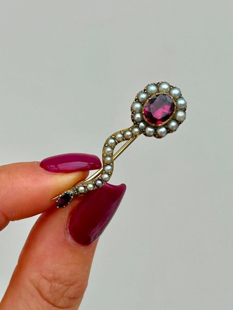 Georgian Flat Cut Garnet and Pearl Haley’s Comet Gold Brooch: Georgian Flat Cut Garnet and Pearl Haley’s Comet Gold Brooch the most charming garnet and pearl brooch, truly excellent! measurements length 40mm width 12mm weight 3.92g