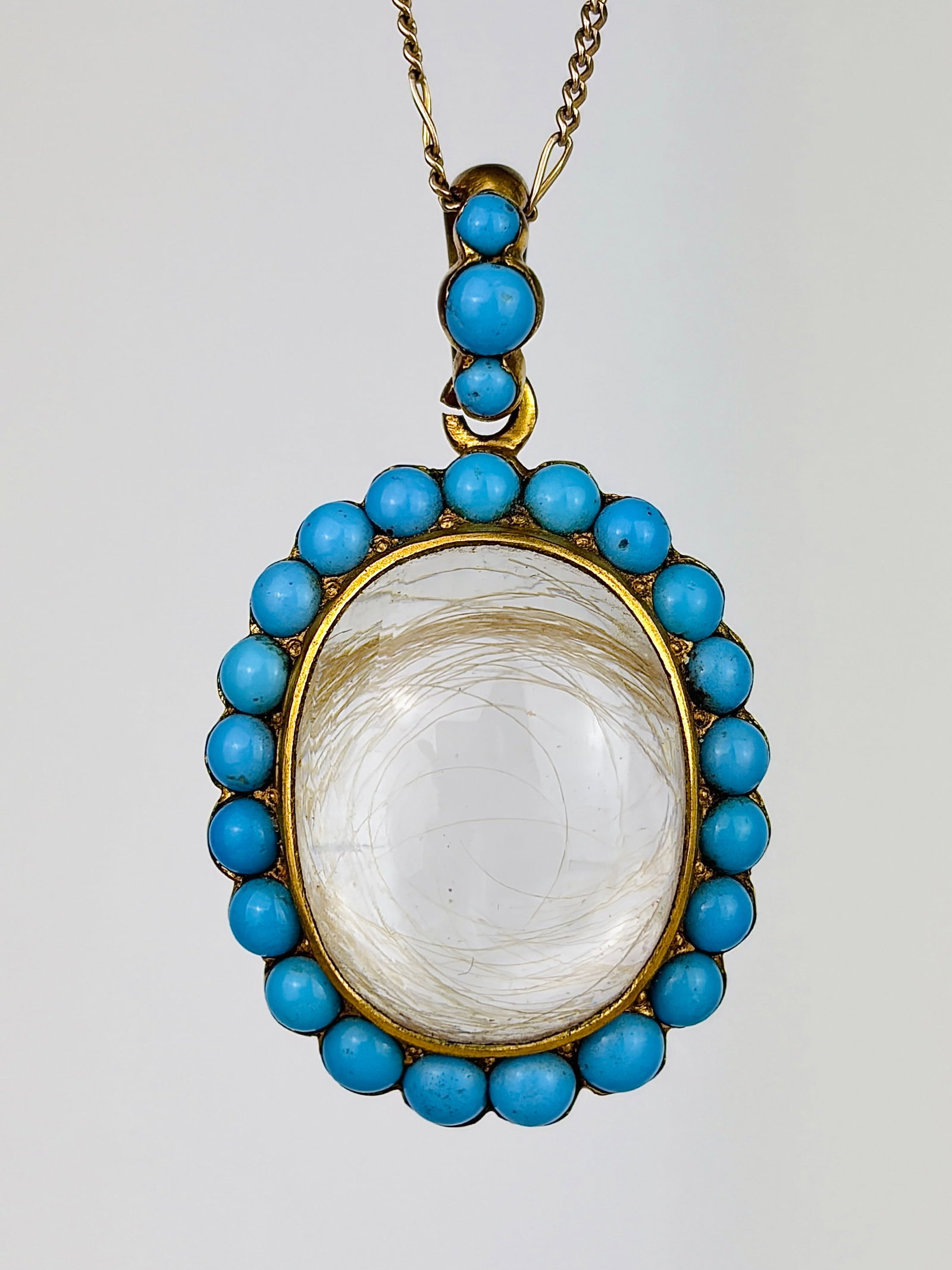 Antique Turquoise Locket Pendant in Gold: Antique Turquoise Locket Pendant in Gold Weight: 13.42g Size: 42x25x10mm Materials: Gold Hallmarks: None present Condition: The overall condition is very good Office Use: QDZ The item will be