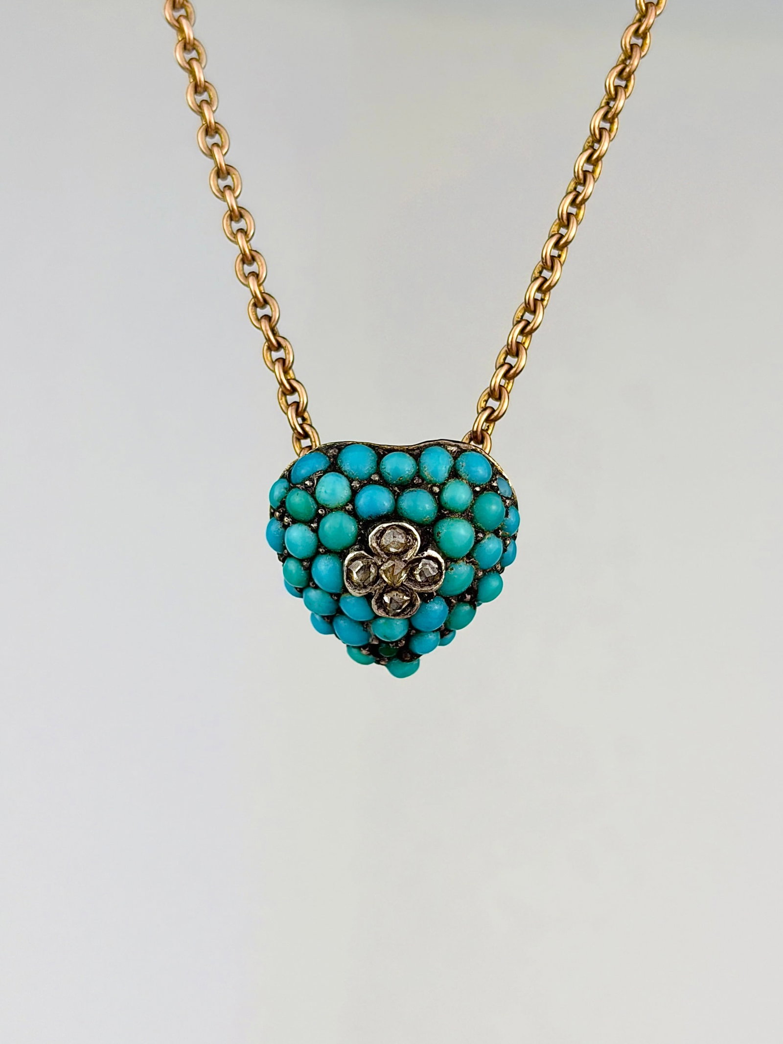 ANTIQUE GOLD ROSE CUT DIAMOND FLOWER / PAVE TURQUOISE HEART PENDANT ON GOLD CHAIN: ANTIQUE GOLD ROSE CUT DIAMOND FLOWER / PAVE TURQUOISE HEART PENDANT ON GOLD CHAIN Truly beautiful necklace!