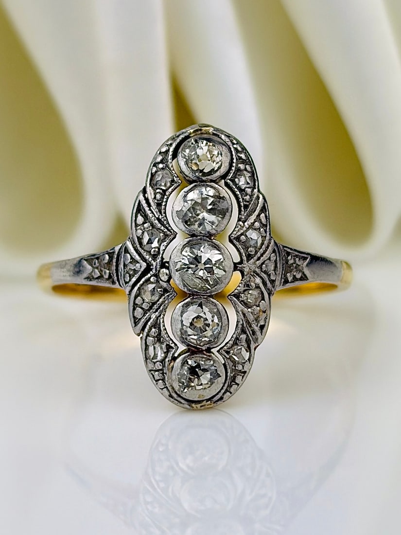 ANTIQUE ART DECO ERA 18CT YELLOW GOLD AND PLATINUM DIAMOND PANEL RING: ANTIQUE ART DECO ERA 18CT YELLOW GOLD AND PLATINUM DIAMOND PANEL RING Gorgeous ring that was crafted in the 1920's Art Deco era that was known for its symmetrical, intricate designs! Weight: 3g