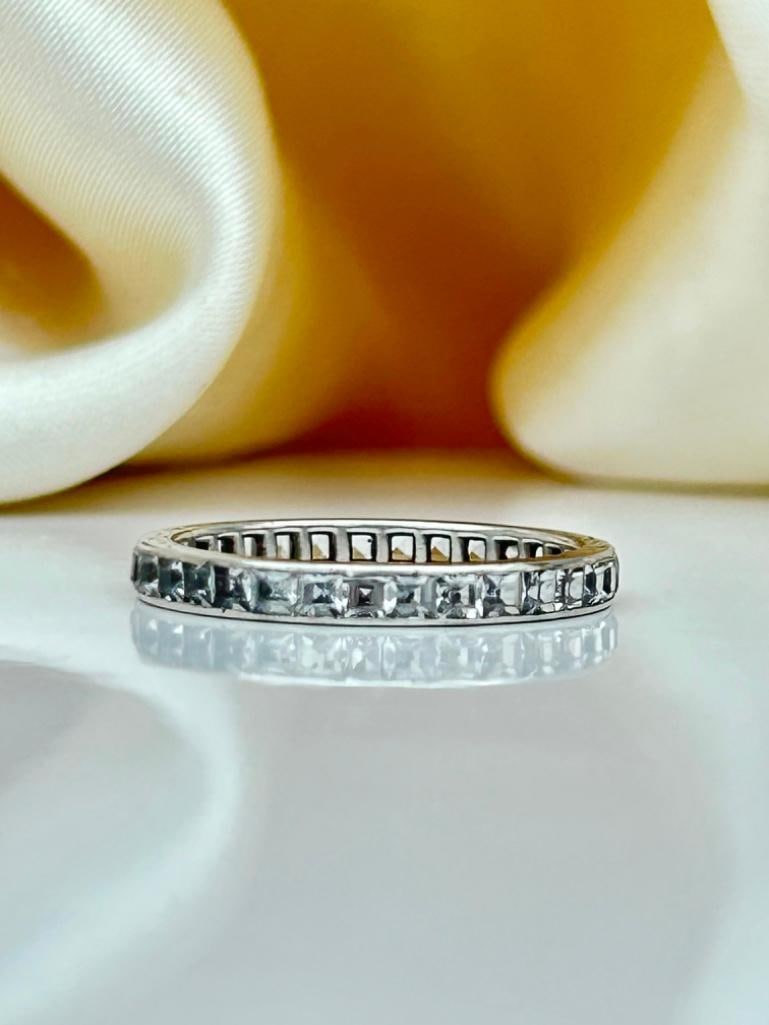 Wonderful White Sapphire Full Eternity Band Ring in White Gold: Wonderful White Sapphire Full Eternity Band Ring in White Gold beautiful white sapphire eternity!! measurements size UK P US 8 band width 2mm weight 1.66g ma