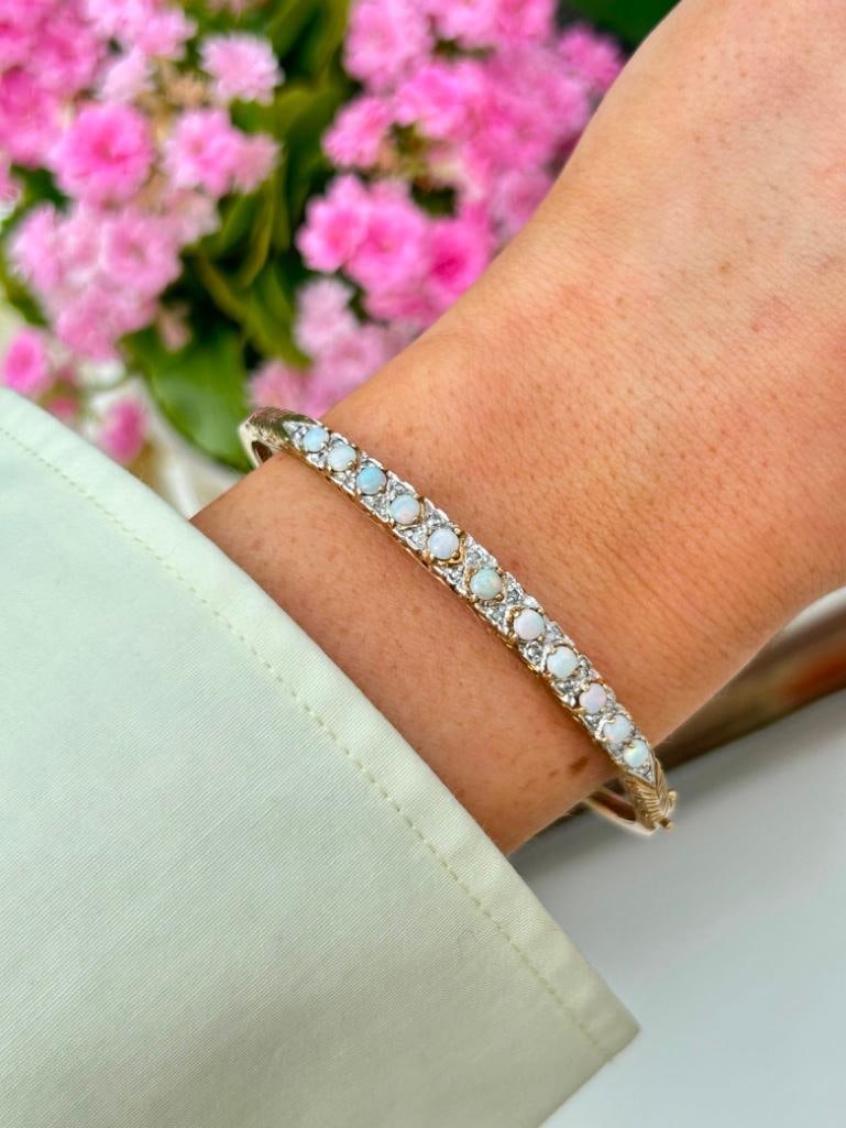 9ct Yellow Gold Opal and Diamond Bangle Bracelet: 9ct Yellow Gold Opal and Diamond Bangle Bracelet beautiful fiery opals with diamond details, truly wonderful!! measurements inner diameter 60mm x 50mm width 5mm weight