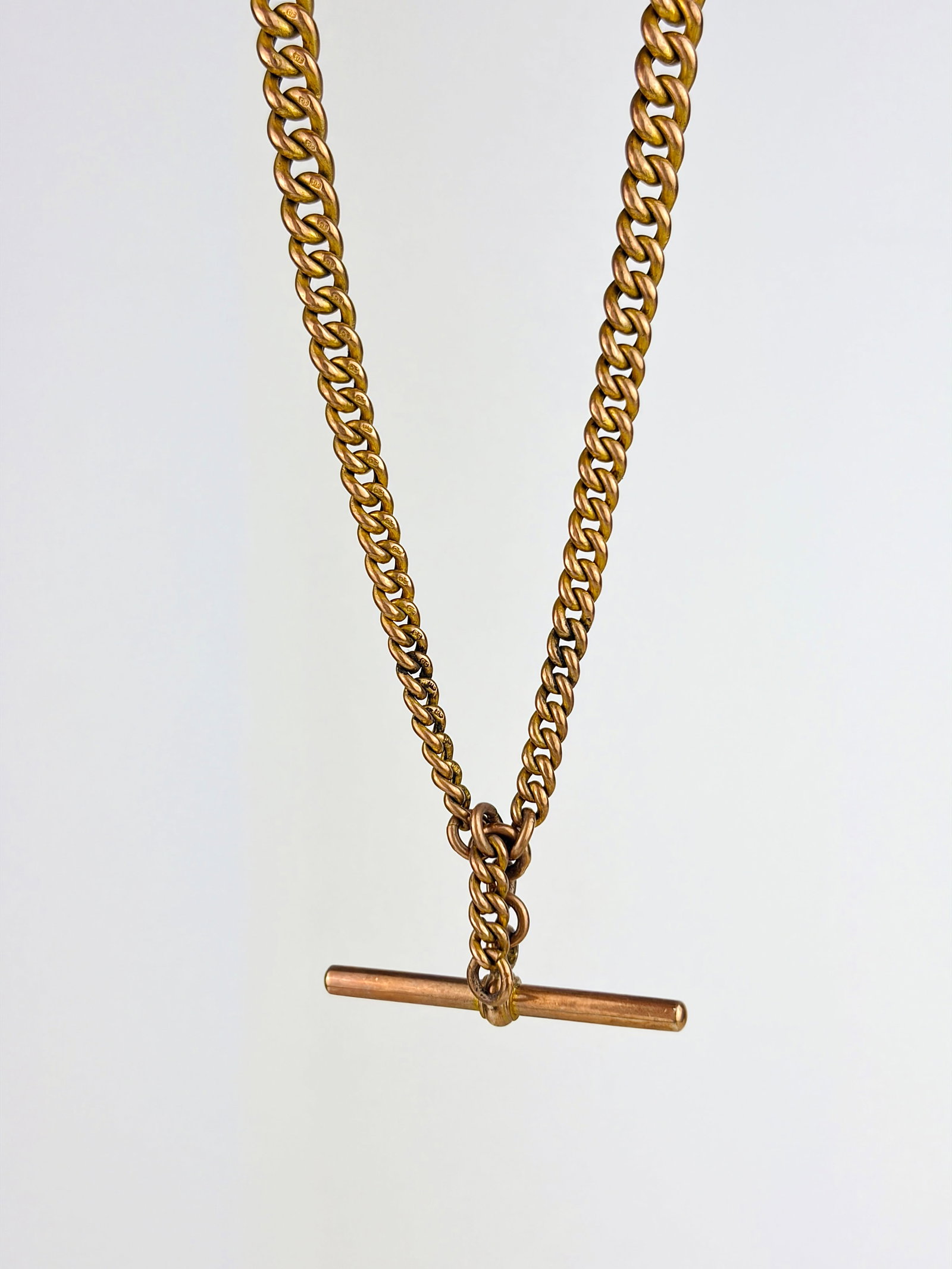 ANTIQUE 9CT GOLD DOUBLE ALBERT CHAIN WITH TBAR AND GRADUATED LINKS: ANTIQUE 9CT GOLD DOUBLE ALBERT CHAIN WITH TBAR AND GRADUATED LINKS A perfect tight albert chain perfect for layering, or make a statement on its own. 