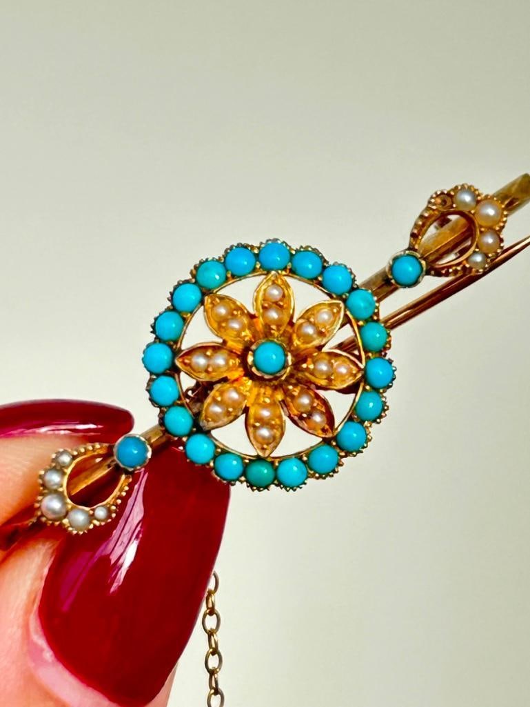 Pretty Antique Turquoise and Pearl Flower Brooch in Gold: Pretty Antique Turquoise and Pearl Flower Brooch in Gold sweetest detailed brooch measurements size 43mm x 16mm Weight: 4.95g materials gold turquoise and pearl