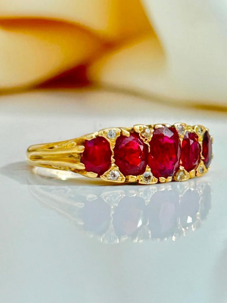 Chunky 18ct Yellow Gold Ruby and Diamond 5 Stone Ring: Chunky 18ct Yellow Gold Ruby and Diamond 5 Stone Ring 5 gorgeous ruby stones with sweet diamond points, exquisite!! measurements size UK P US 8 head of ring 20mm x 6mm weight 6.2