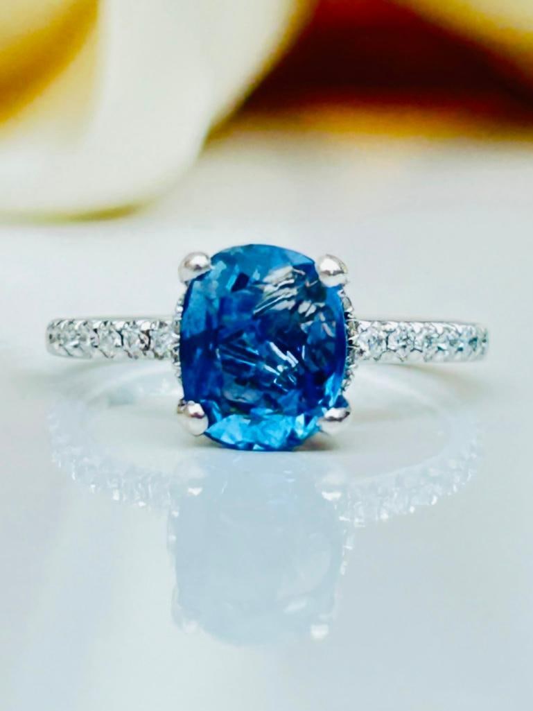 Outstanding Diamond Encrusted Sapphire Solitaire Ring: Outstanding Diamond Encrusted Sapphire Solitaire Ring the prettiest sapphire ring with sweet diamonds measurements size UK I US 43/4 head of ring 7mm x 7mm weight 3.43g
