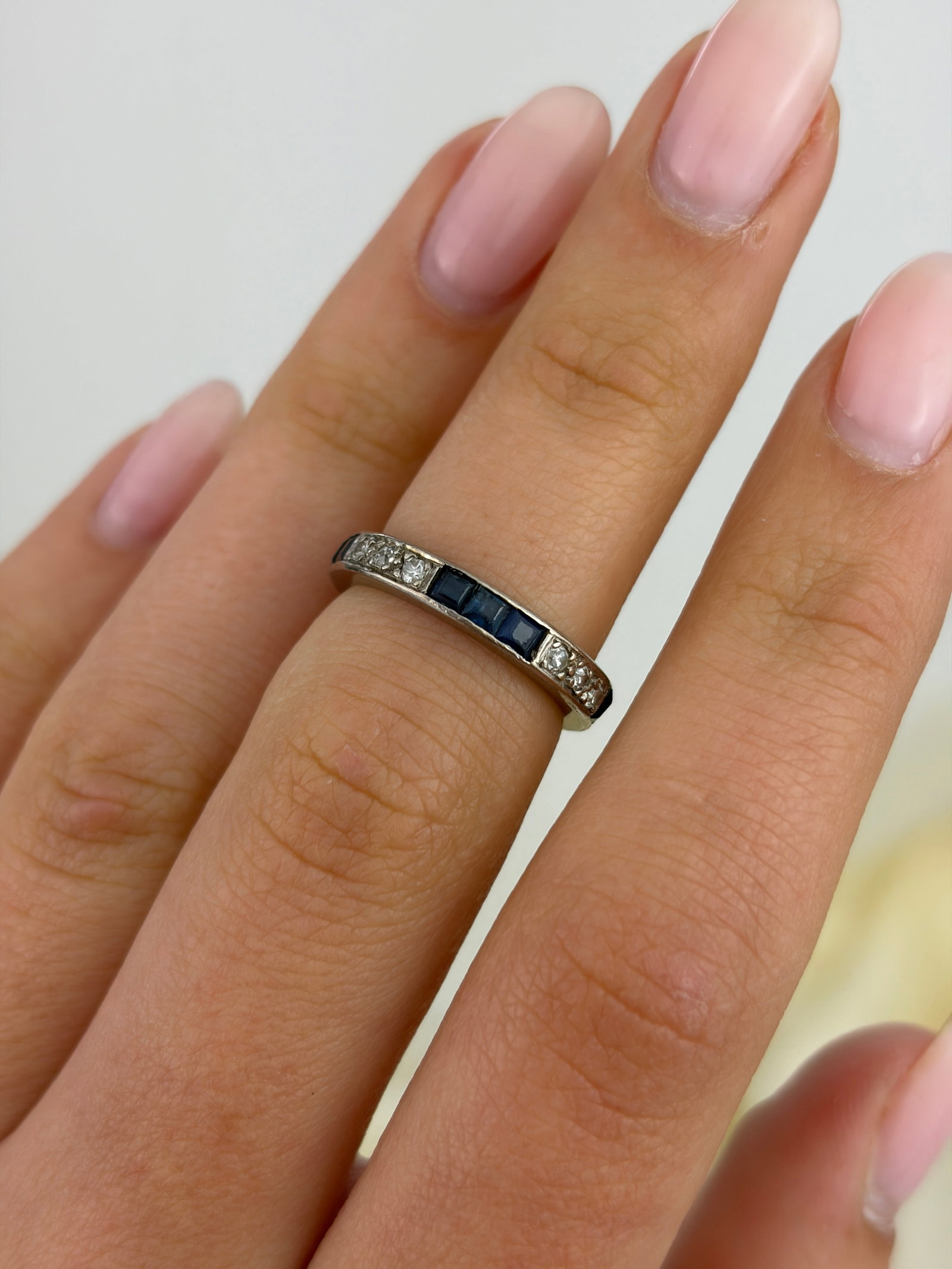 ANTIQUE ART DECO ERA 18CT WHITE GOLD SAPPHIRE AND DIAMOND FULL ETERNITY BAND RING - 7