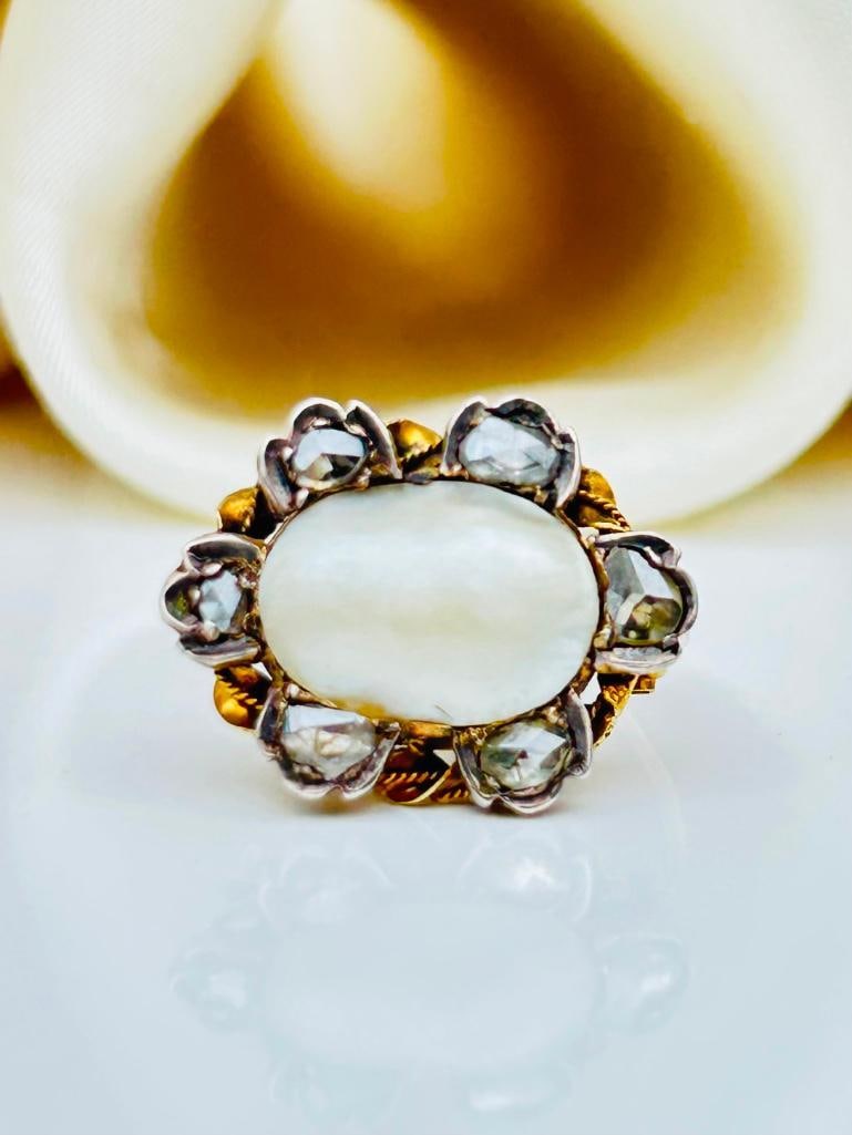 Amazing Pearl and Rose Cut Diamond Gold Brooch: Amazing Pearl and Rose Cut Diamond Gold Brooch truly precious and truly beautiful measurements size 20mm x 16mm weight 3g materials 9ct gold pear