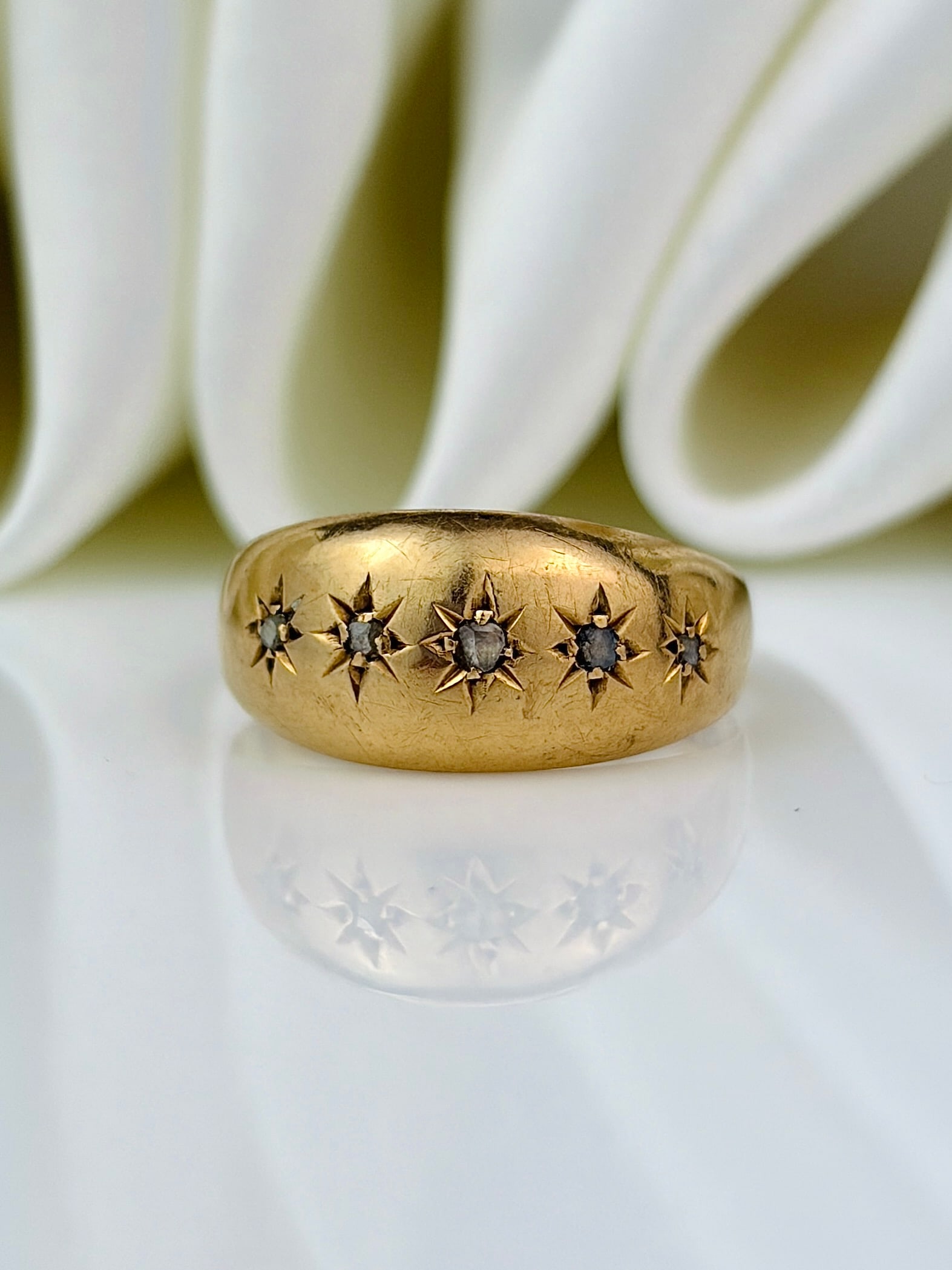 18ct yellow gold diamond 5 stone starburst star ring: 18ct yellow gold diamond 5 stone starburst star ring Super chunky! Weight: 2.62g Size: UK M1/2, US 6.75, Width 8.4mm, Height off finger 2.4mm Materials: 18ct gold Hallmarks: Birmingham,