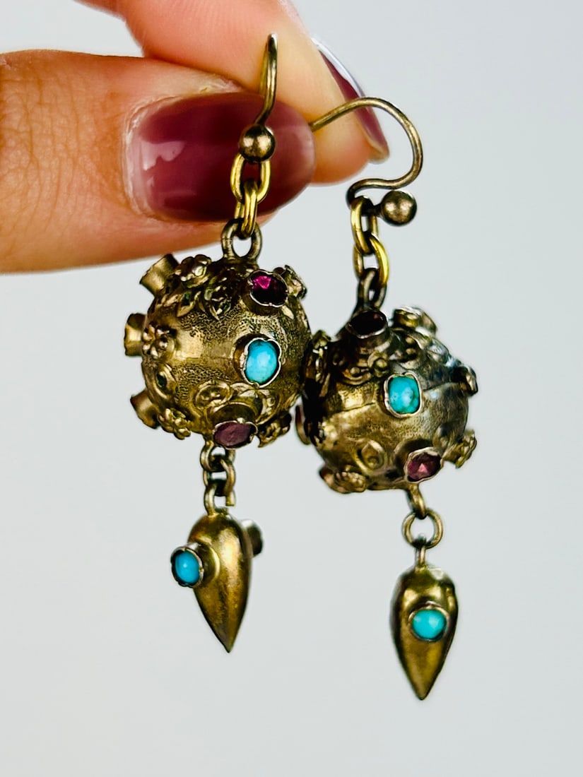 Victorian Turquoise and Flat Cut Garnet Sputnik Earrings in Gilt Metal: Victorian Turquoise and Flat Cut Garnet Sputnik Earrings in Gilt Metal Weight: 3.76g Size: Drop 51mm, Width 15mm Materials: Gilt metal Hallmarks: None present Condition: The overall condition