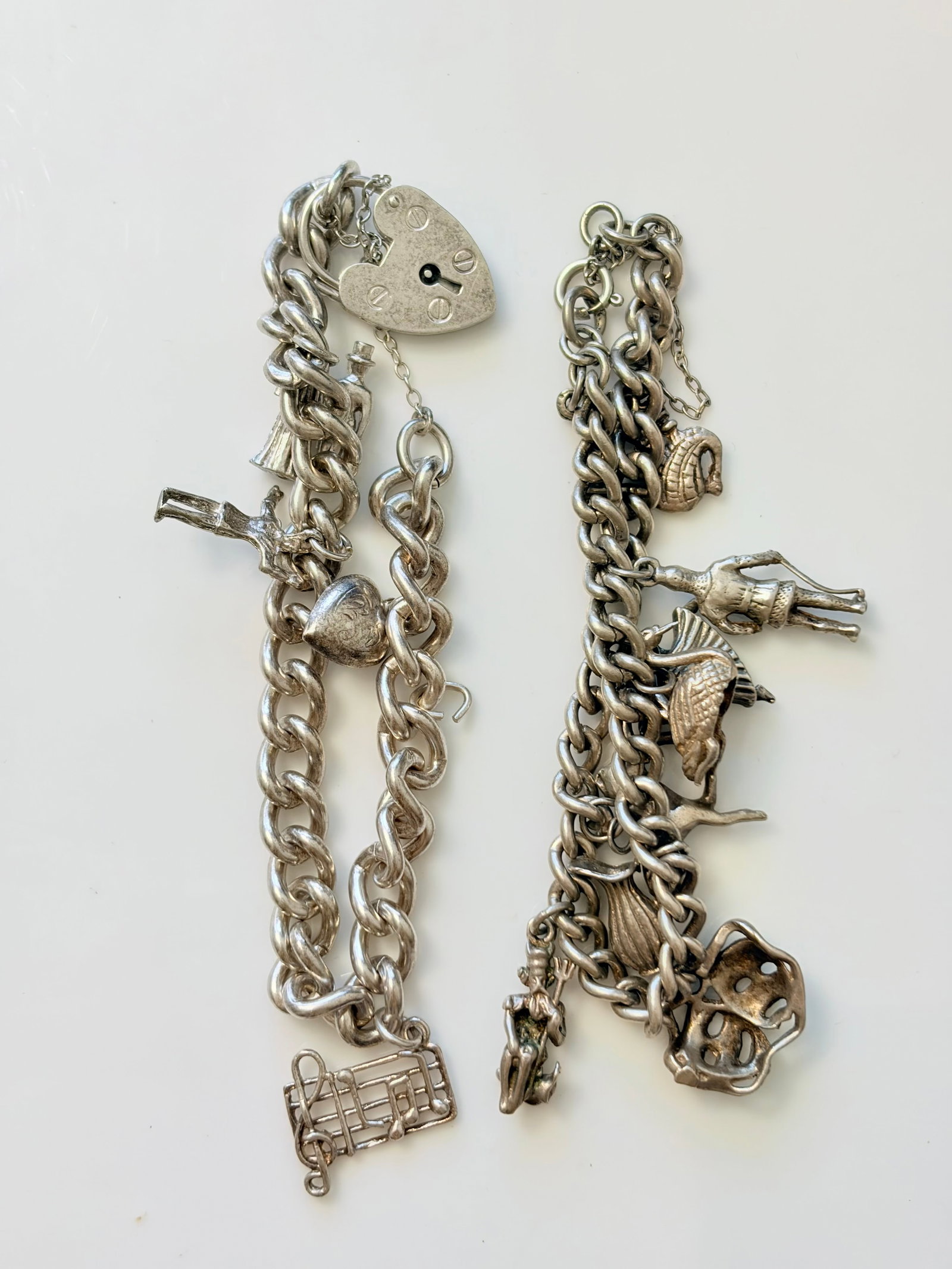 MIXED LOT- SILVER CHARM BRACELETS ETC: MIXED LOT- SILVER CHARM BRACELETS ETC