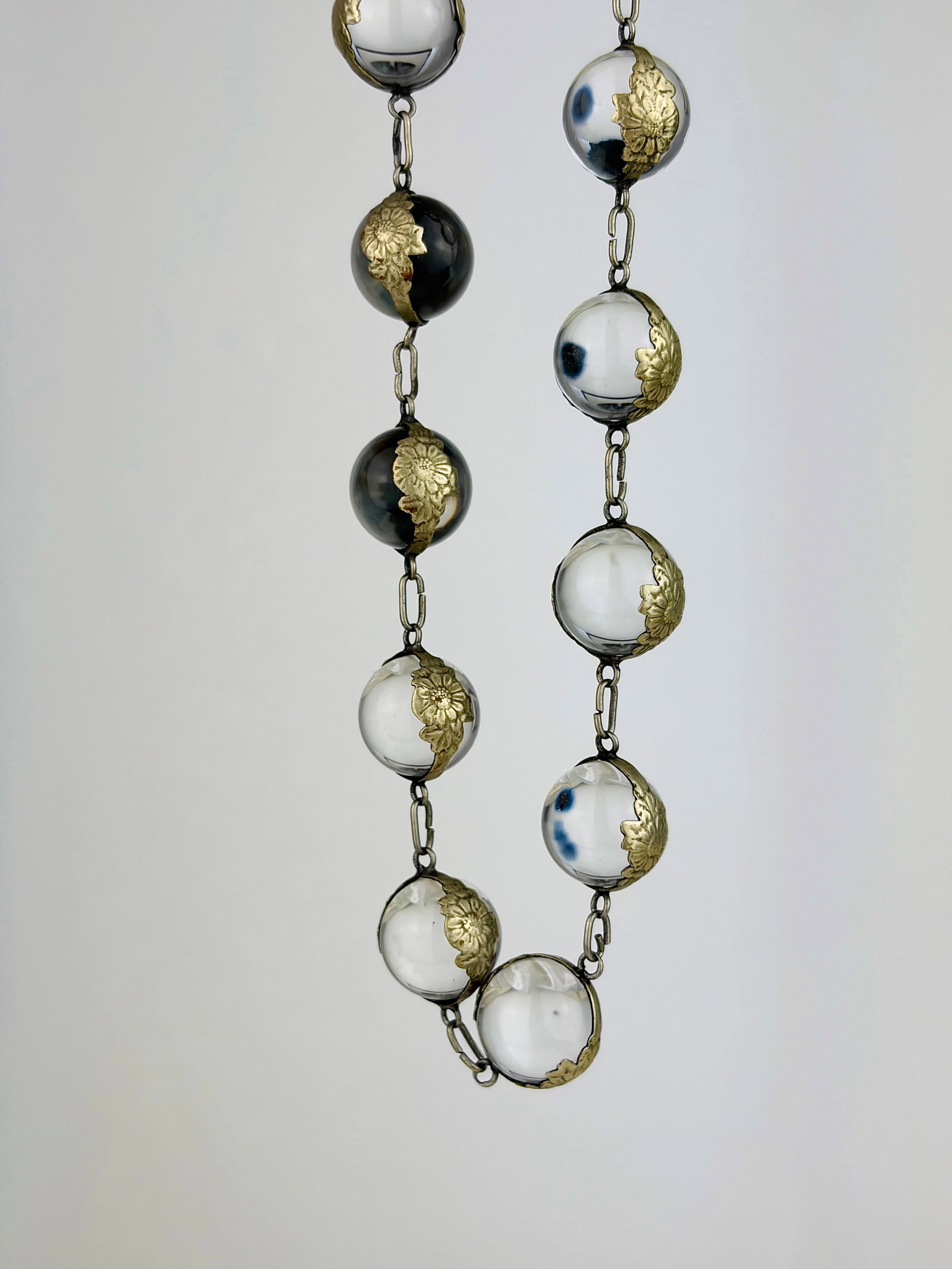 ANTIQUE POOL OF LIGHT NECKLACE: ANTIQUE POOL OF LIGHT NECKLACE Weight: 55.17g Size: Length 44.5cm, width 13mm Condition: Very good overall condition. Some signs of wear are expected given the piece’s age. Please refer to