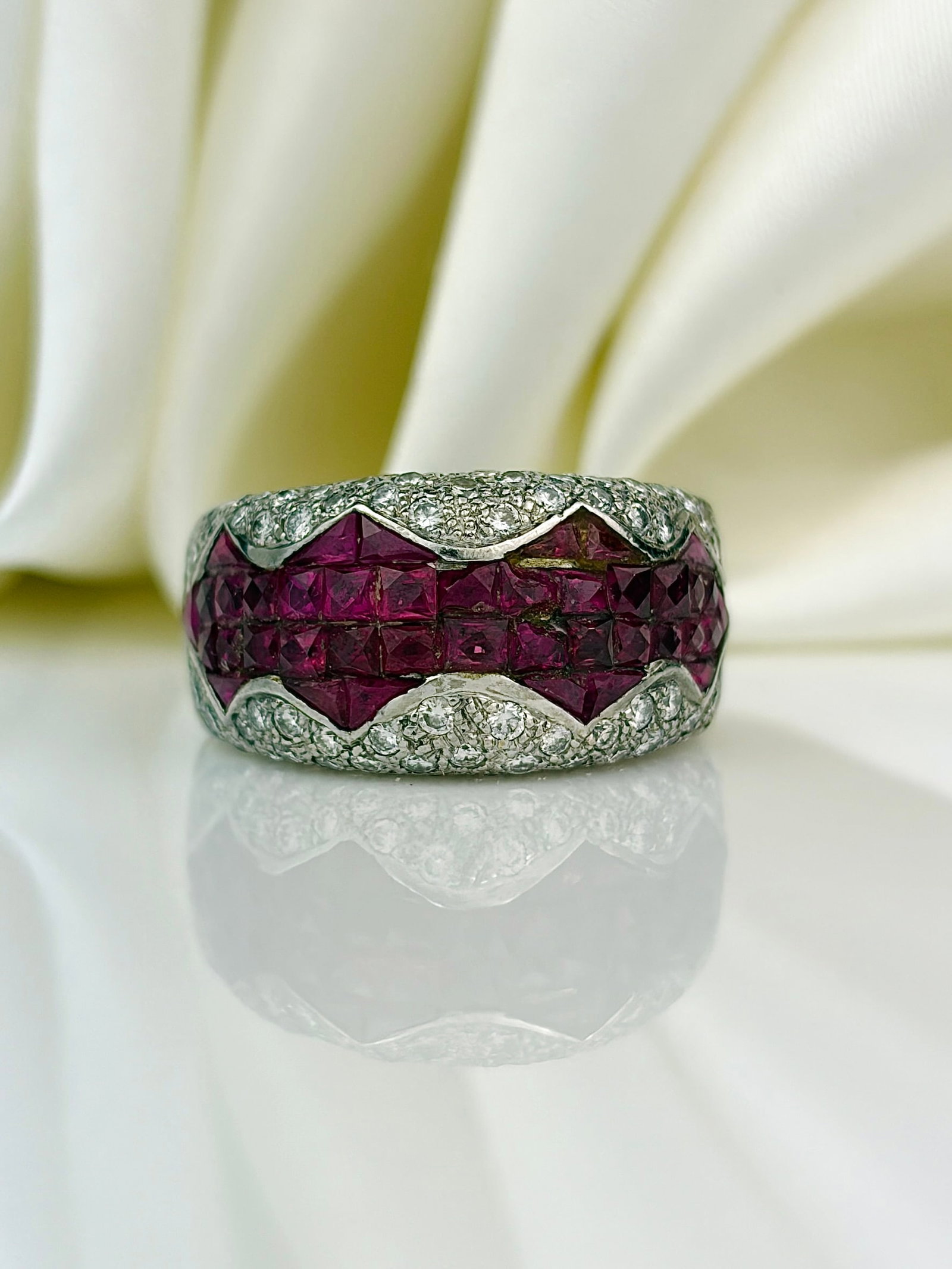 heavy 18ct white gold ruby and diamond ring: heavy 18ct white gold ruby and diamond ring Incredible, chunky domed ring with a unique layout of square cut rubies and diamonds!