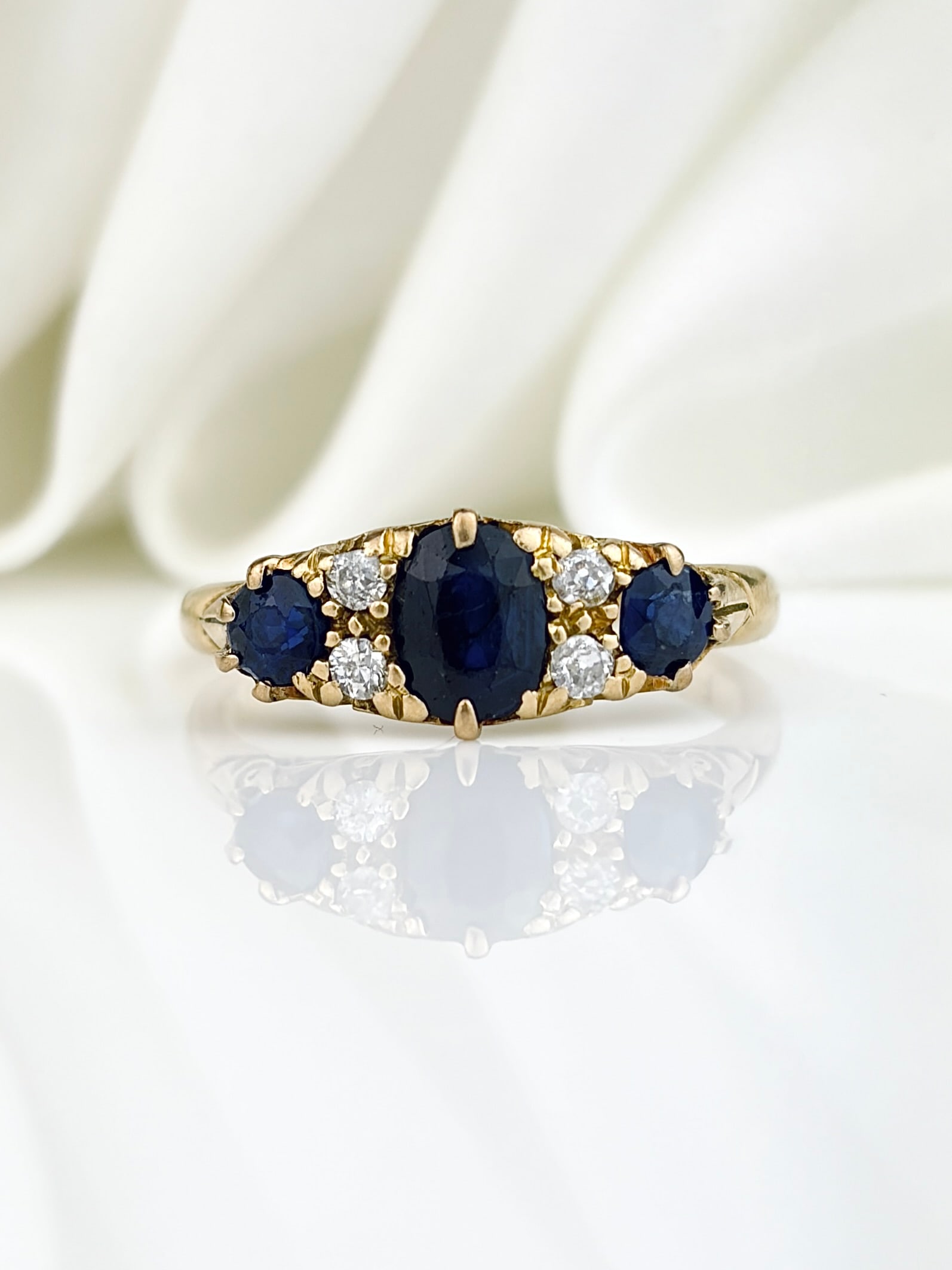 Chunky 18ct Yellow Gold Sapphire And Diamond Ring: Chunky 18ct Yellow Gold Sapphire And Diamond Ring Beautiful deep blue sapphire stones separated by sparkling diamonds!