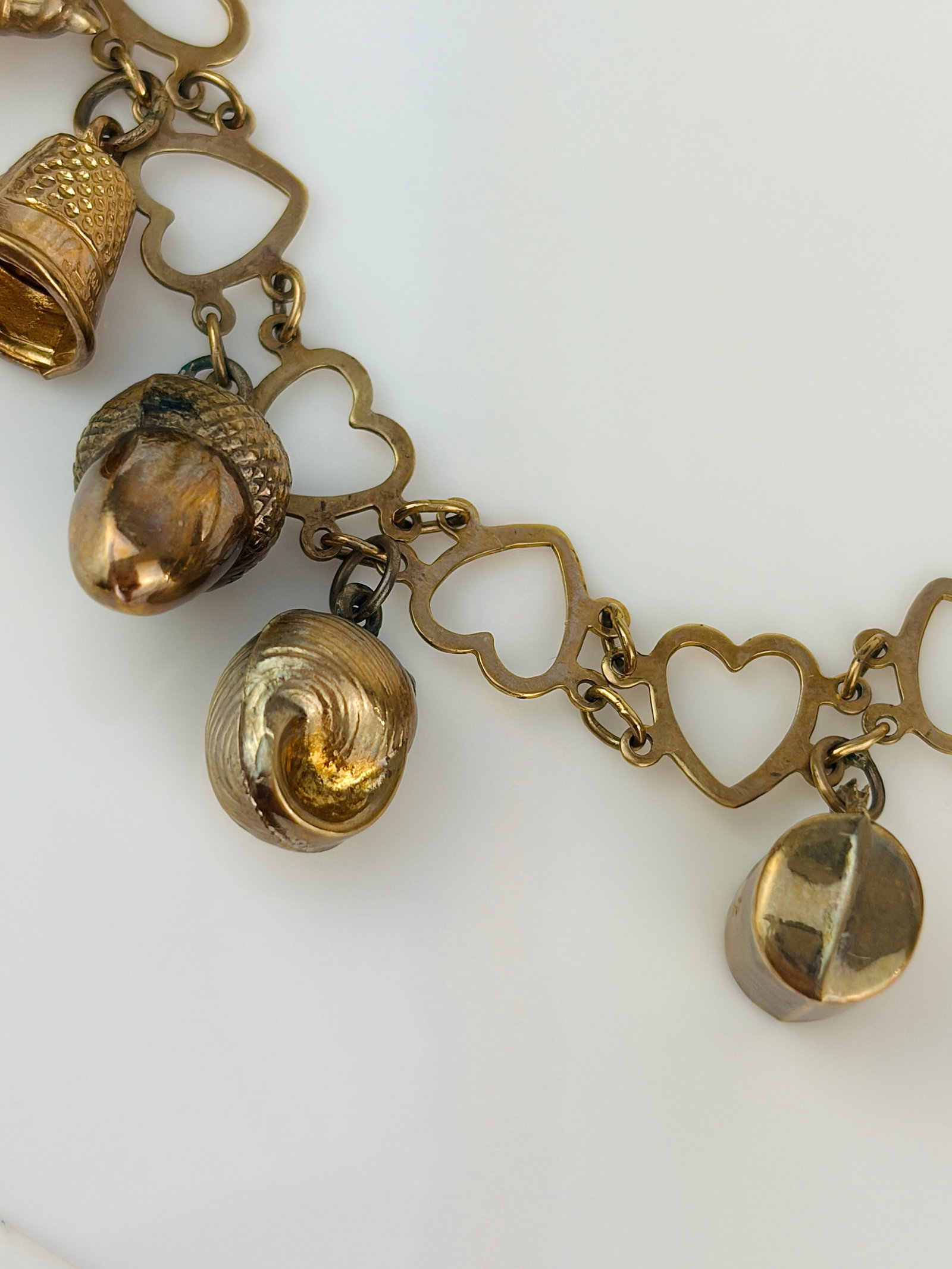 vintage hearts bracelet full of charms all in 9ct gold - 5