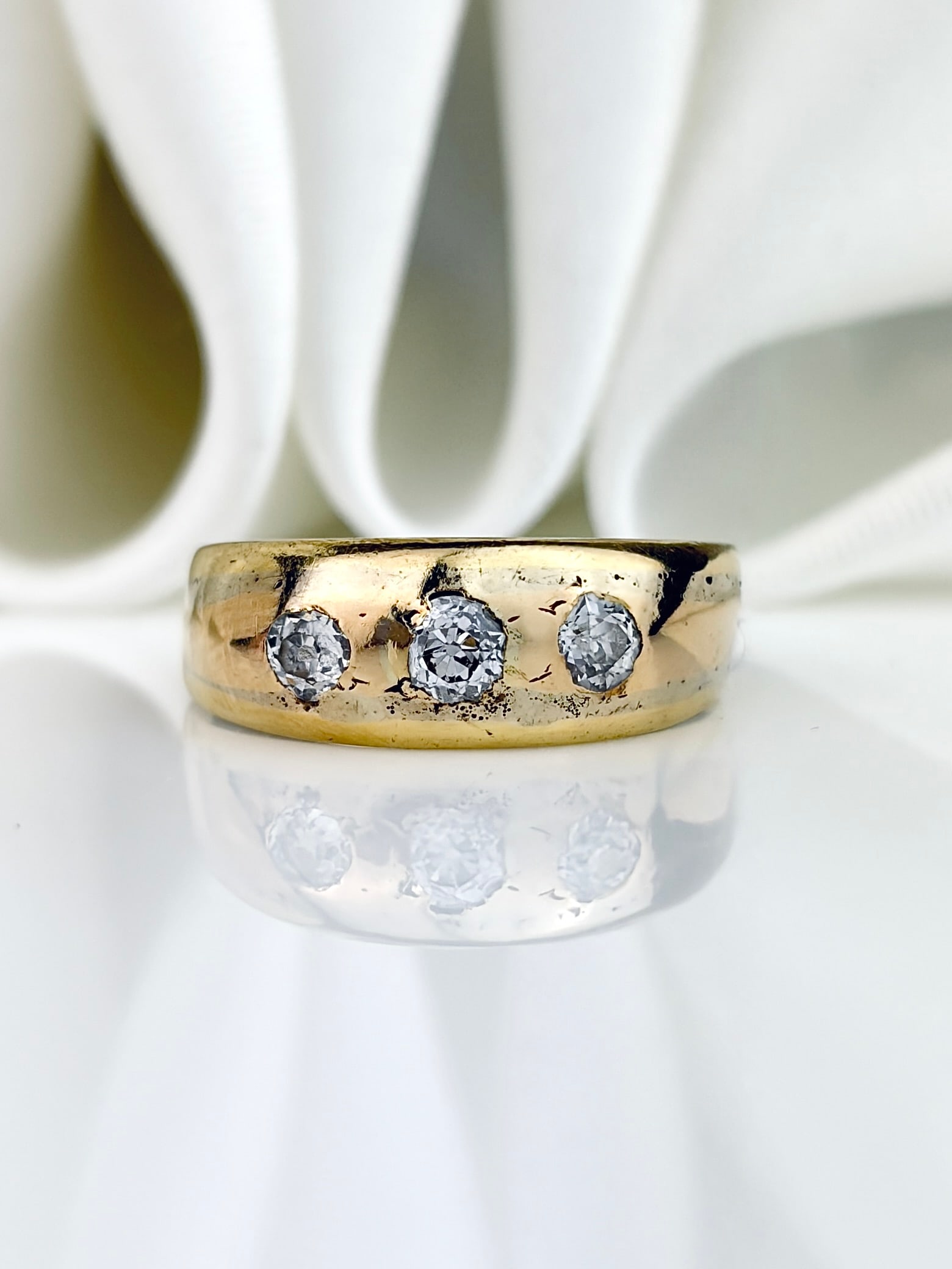 Antique Gold Diamond 3 Stone Ring: Antique Gold Diamond 3 Stone Ring Such a sweet ring. Weight: 4.73g Size: UK M, US 6.5, Width 12mm, height off finger 8mm Materials: gold, diamond Hallmarks: None present Condition:
