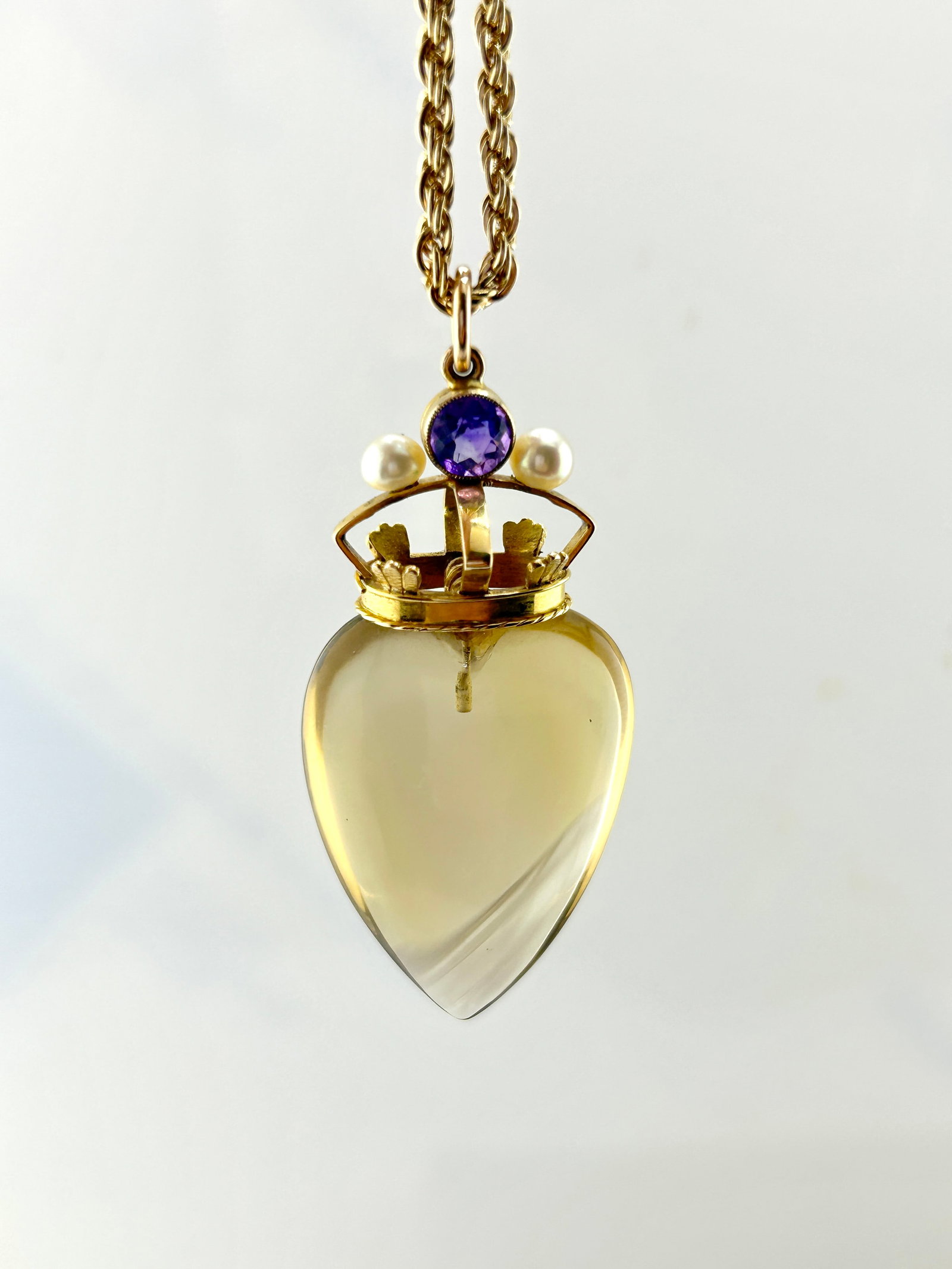 Huge antique carved citrine heart pendant with gold amethyst and pearl crown: Huge antique carved citrine heart pendant with gold amethyst and pearl crown A real statement piece ! weight 20.21 g measures 6 x 3 cm widest points hallmarks : none present <