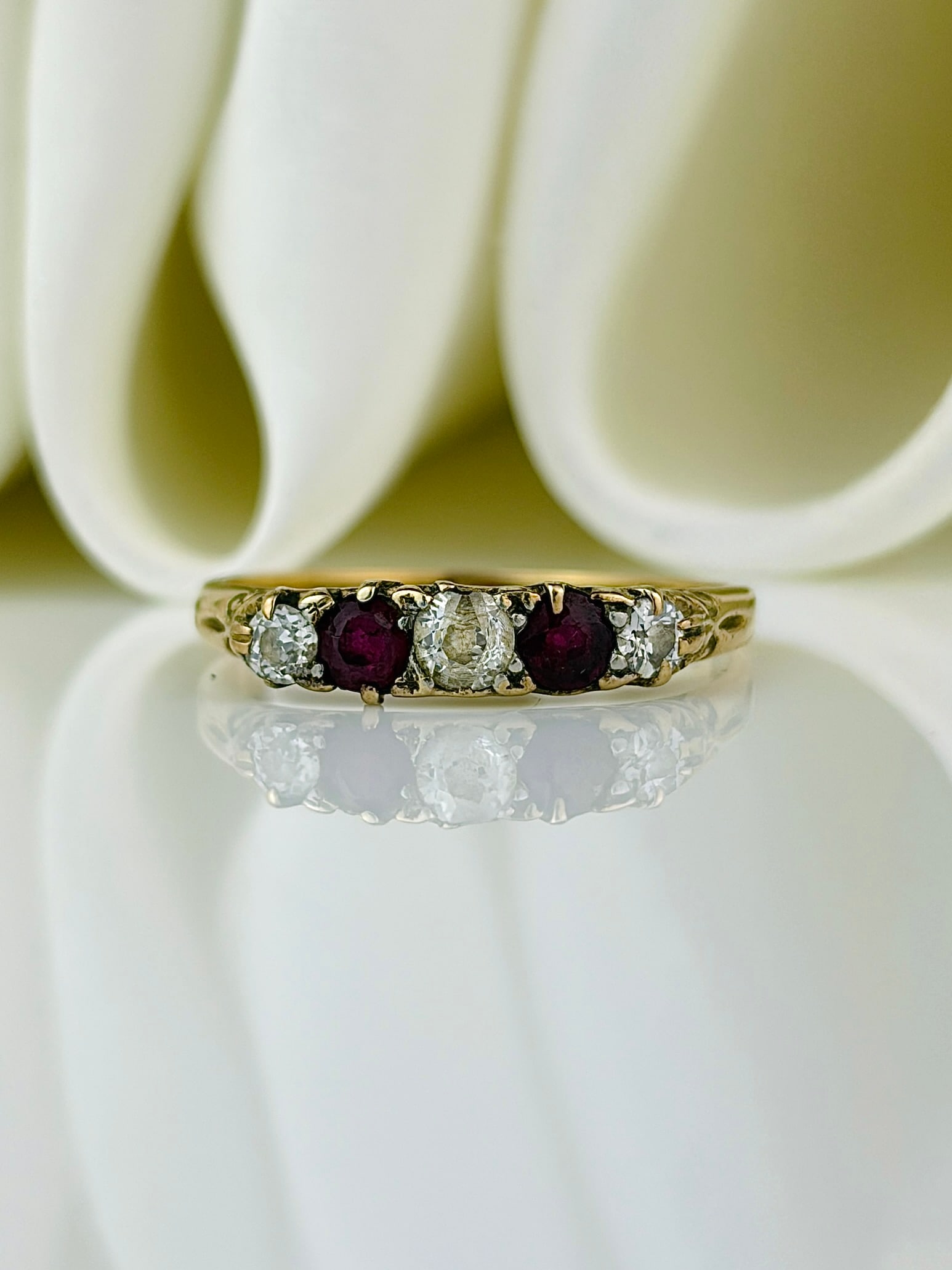 antique 18ct yellow gold ruby and diamond 5 stone ring: antique 18ct yellow gold ruby and diamond 5 stone ring Such a beautiful ring featuring two bright rubies in between three sparkling diamonds!