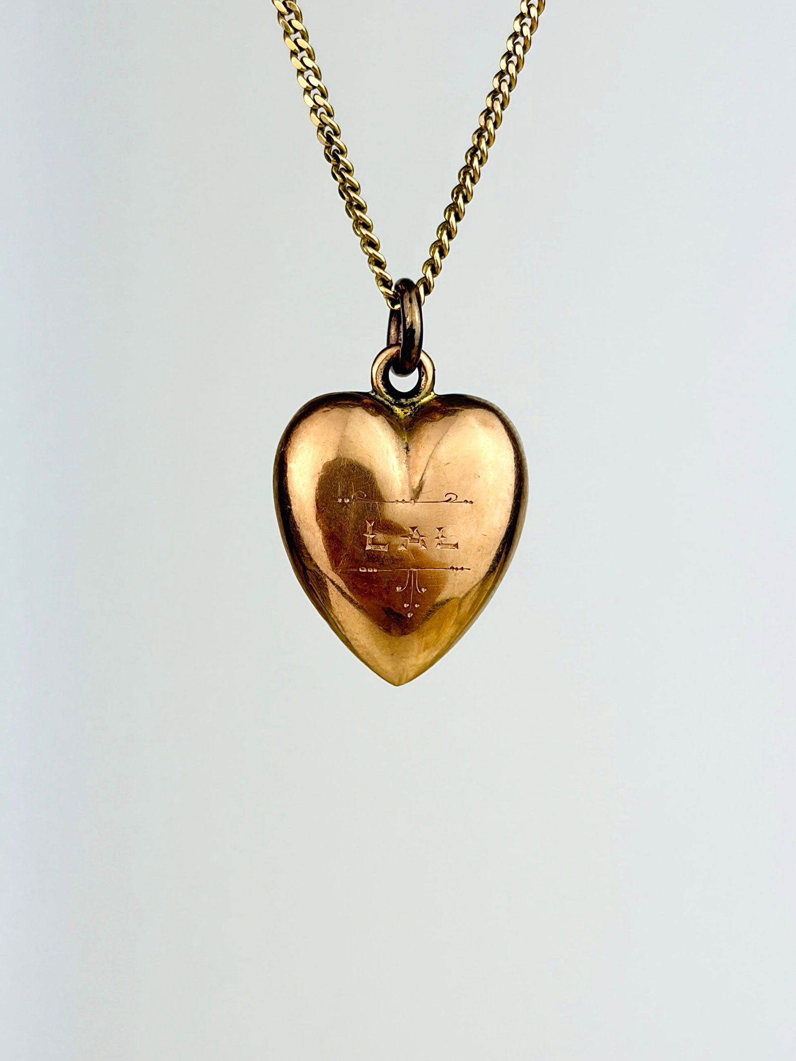 ANTIQUE 9CT GOLD PUFFED HEART PENDANT: ANTIQUE 9CT GOLD PUFFED HEART PENDANT Has the names 'Lal' and 'Tom' engraved subtly, and beautifully one on each side!