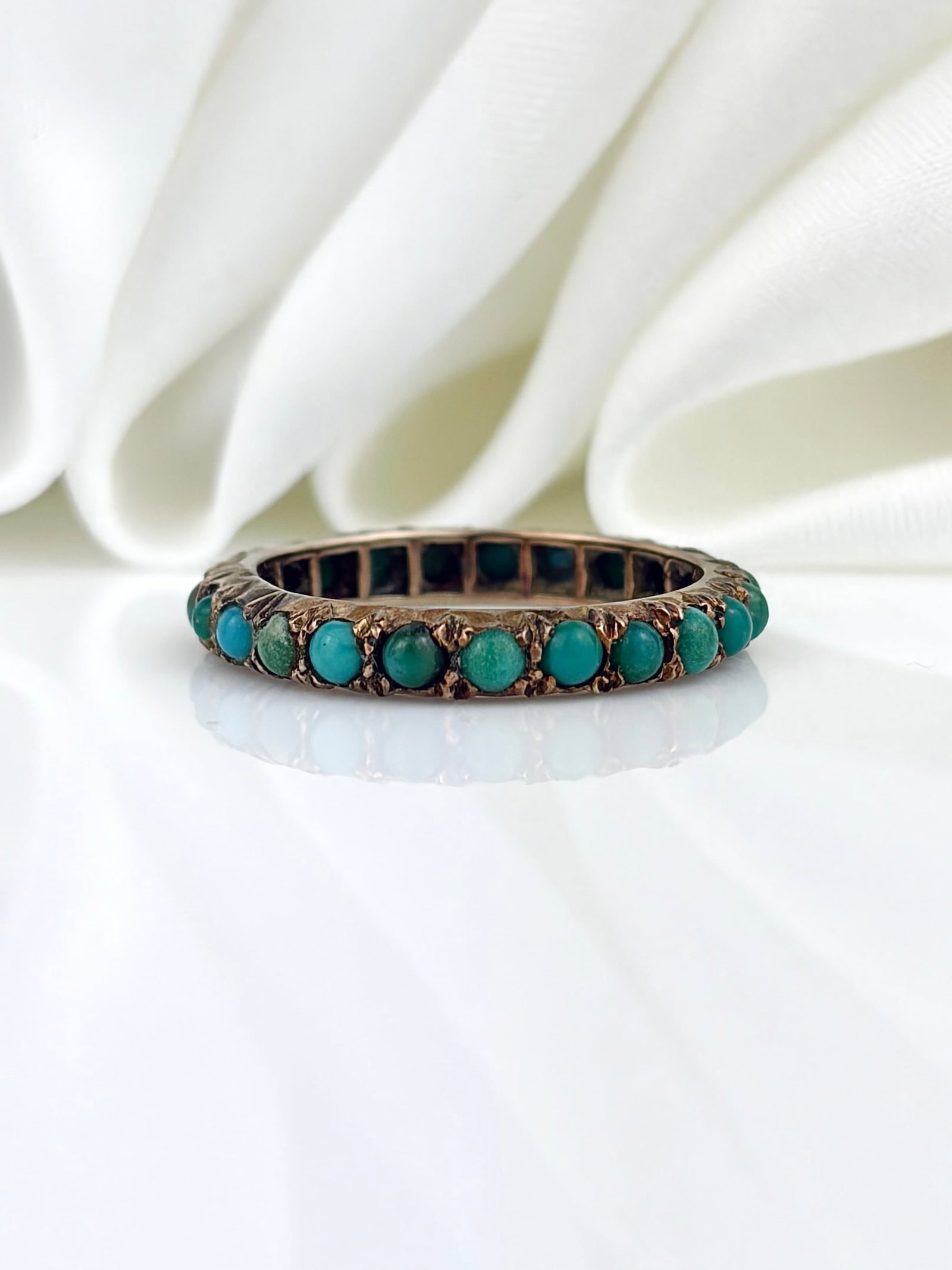 ANTIQUE TURQUOISE FULL ETERNITY BAND RING IN GOLD: ANTIQUE TURQUOISE FULL ETERNITY BAND RING IN GOLD Such beautiful antique turquoise stones set beautifully in a full eternity band!