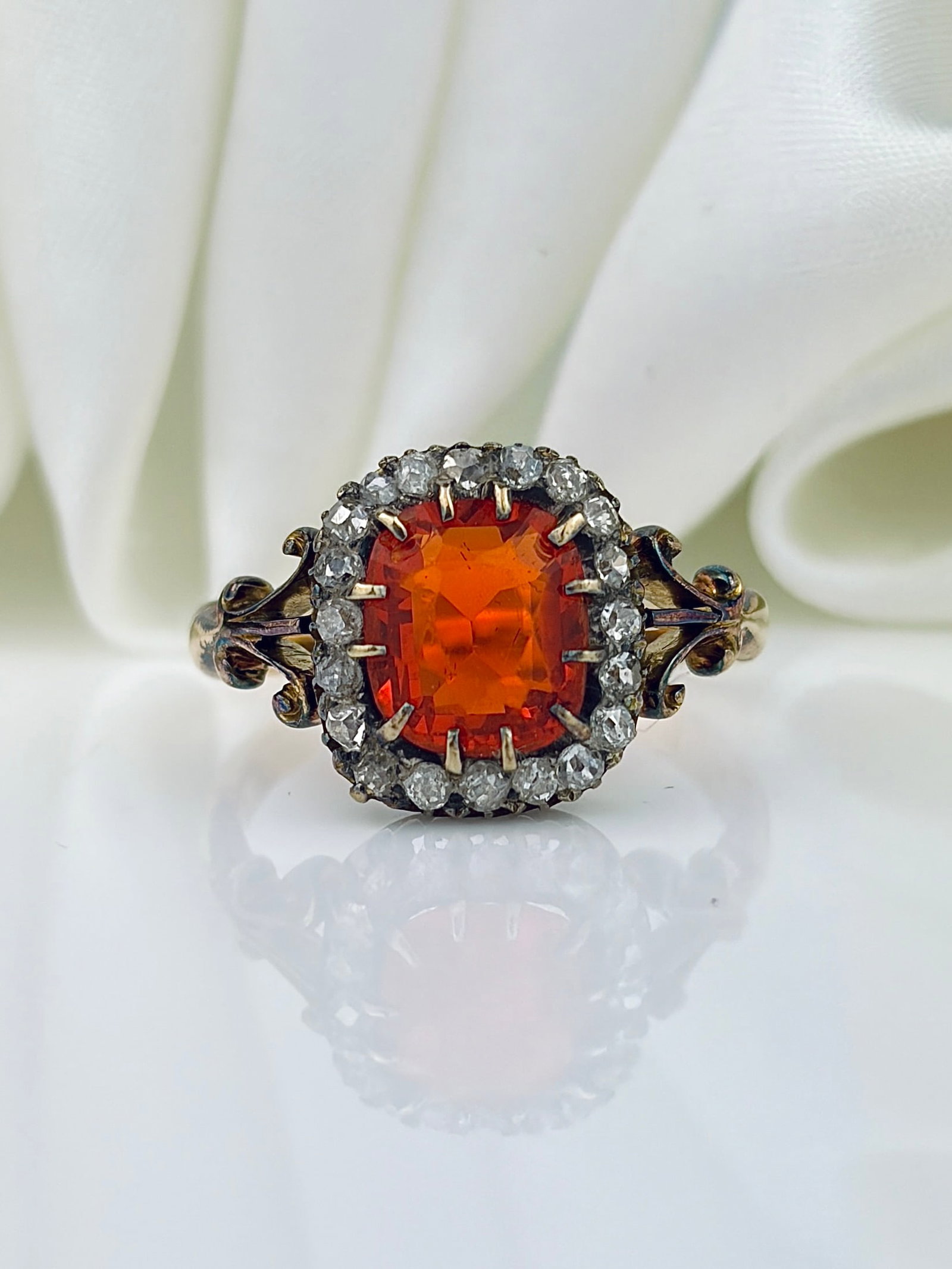 ANTIQUE GOLD FIRE OPAL AND DIAMOND HALO RING: ANTIQUE GOLD FIRE OPAL AND DIAMOND HALO RING Incredible bright fire opal ring!