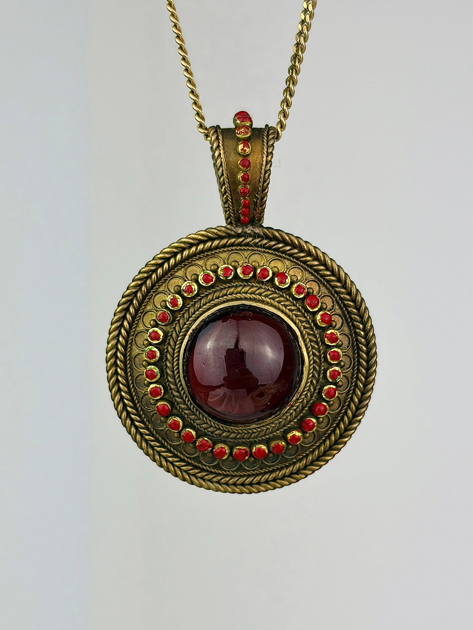 Antique Round Detailed Pendant: A beautifully detailed pendant 