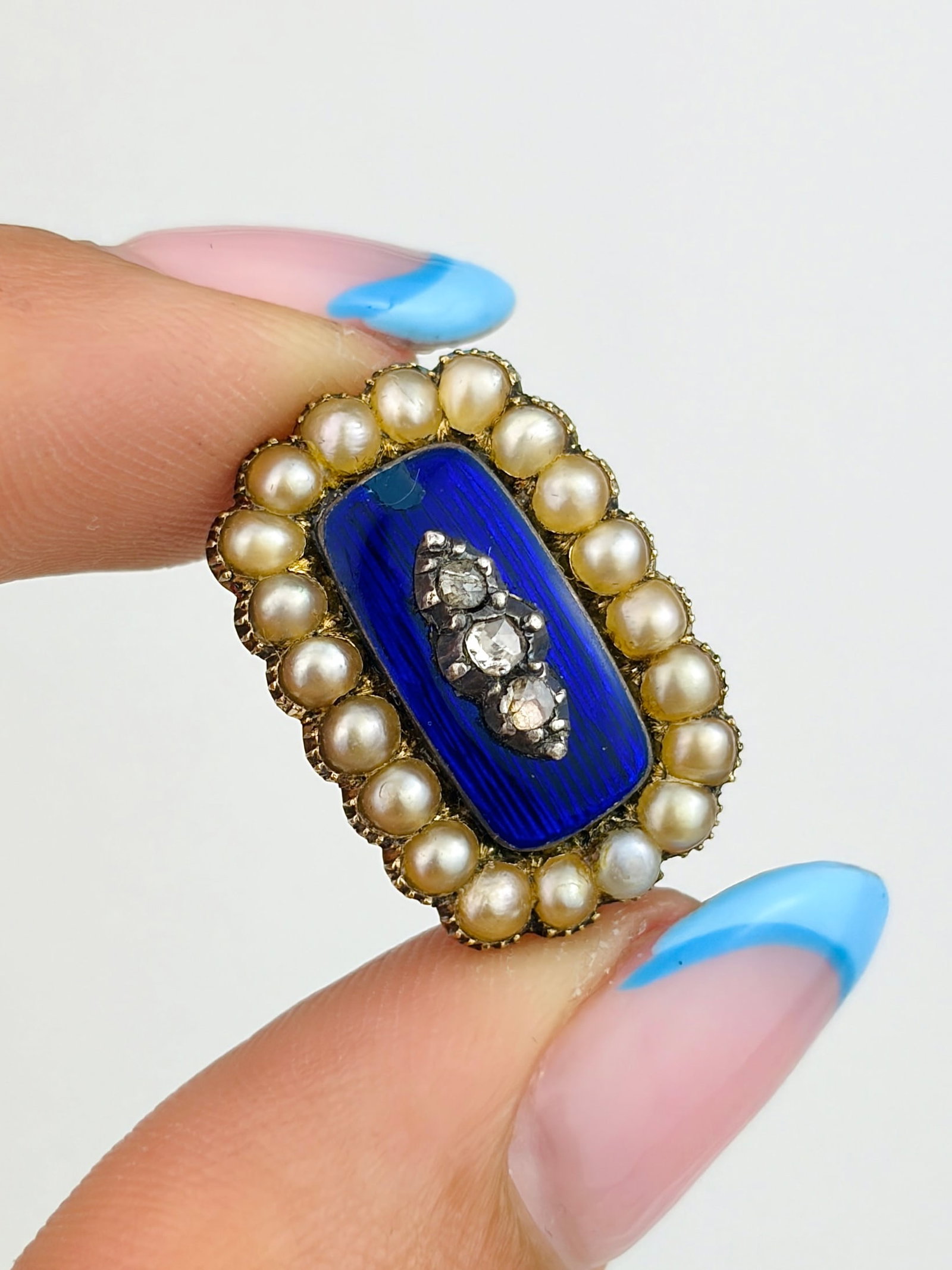 ANTIQUE DIAMOND, BLUE ENAMEL AND PEARL CLUSTER BROOCH IN GOLD: ANTIQUE DIAMOND, BLUE ENAMEL AND PEARL CLUSTER BROOCH IN GOLD Such a gorgeous brooch with the inscription 'H.N May 15th 1825'