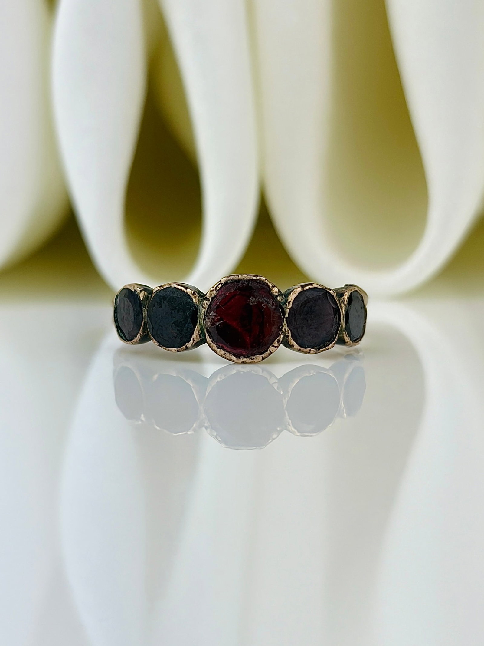Antique flat cut garnet closed back gold ring half hoop band: Antique flat cut garnet closed back gold ring half hoop band Gorgeous garnet stones! Weight: 1.12g Size: UK M, US 6.5, Width Materials: Gold Hallmarks: None present Condition:
