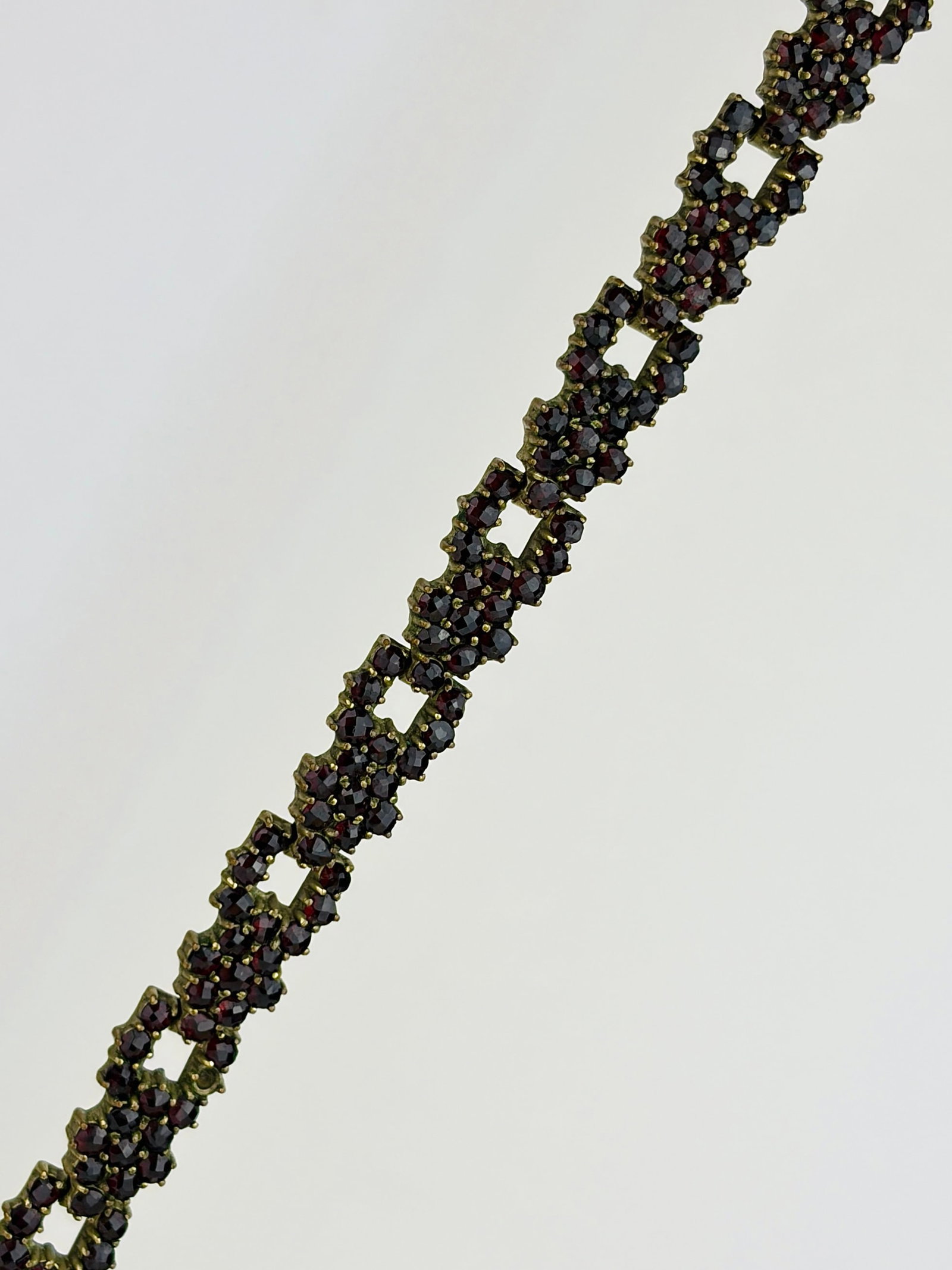 Garnet Cluster Line Bracelet in Yellow Metal: Garnet Cluster Line Bracelet in Yellow Metal