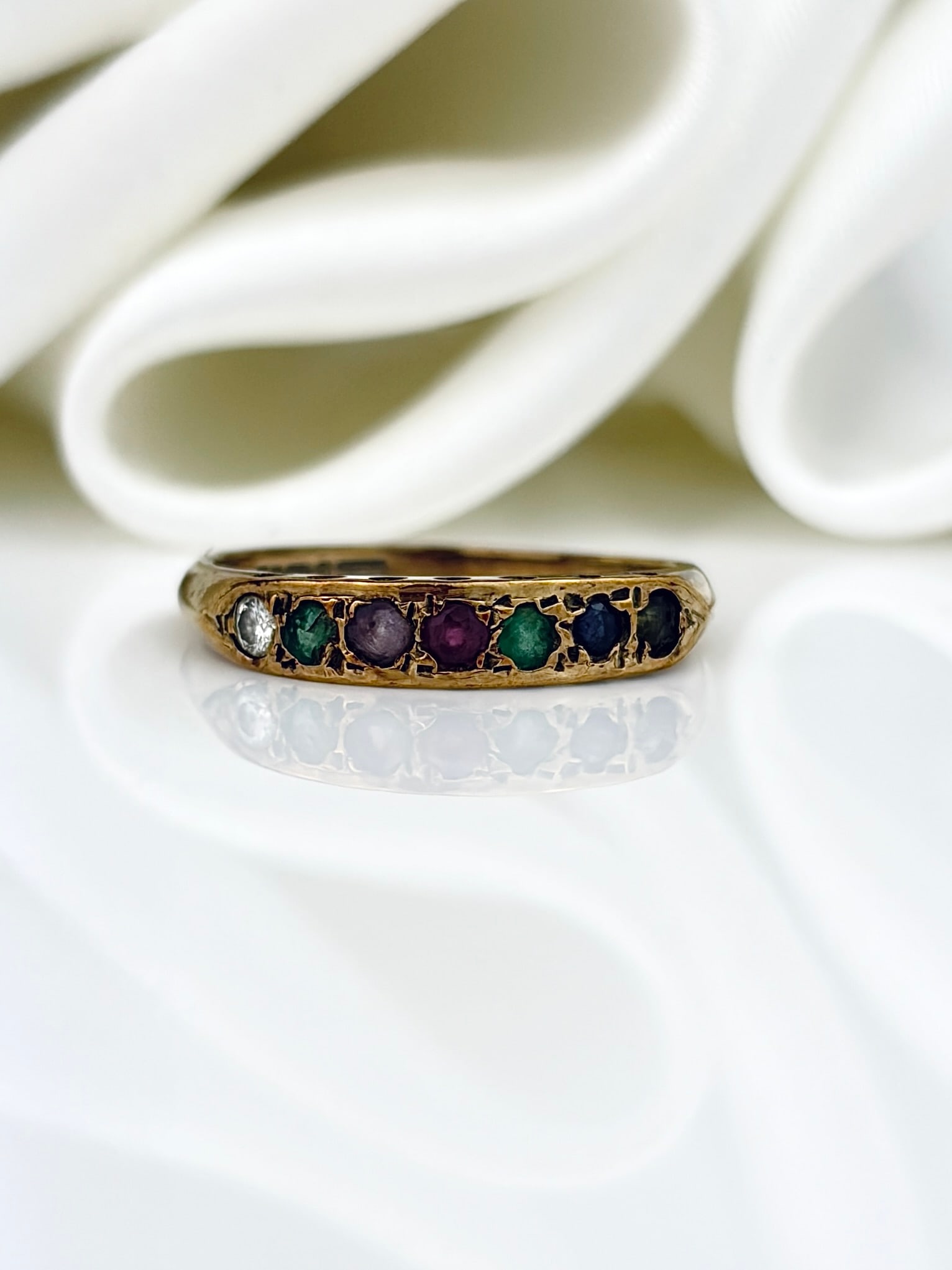 Vintage 9ct Yellow Gold 'Dearest' Acrostic Multigem Half Hoop Ring: Vintage 9ct Yellow Gold 'Dearest' Acrostic Multigem Half Hoop Ring Beautiful multigem ring featuring the secret message of 'dearest' spelt with the first letter of each gemstone - diamond, emerald, am