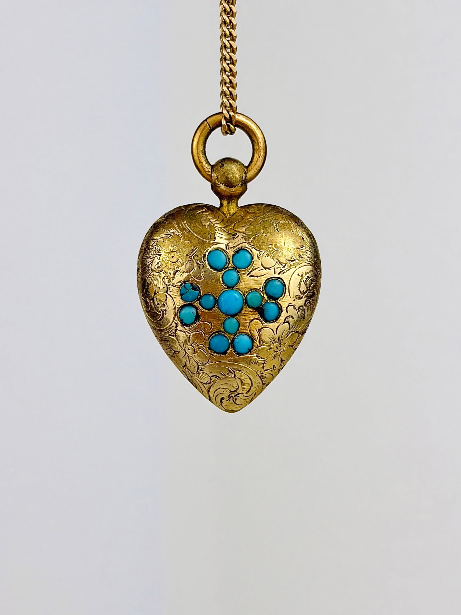 ANTIQUE ORNATE TURQUOISE HEART PENDANT WITH LOCKET BACK IN GOLD: ANTIQUE ORNATE TURQUOISE HEART PENDANT WITH LOCKET BACK IN GOLD Lovely antique heart pendant with a turquoise cross style detail!