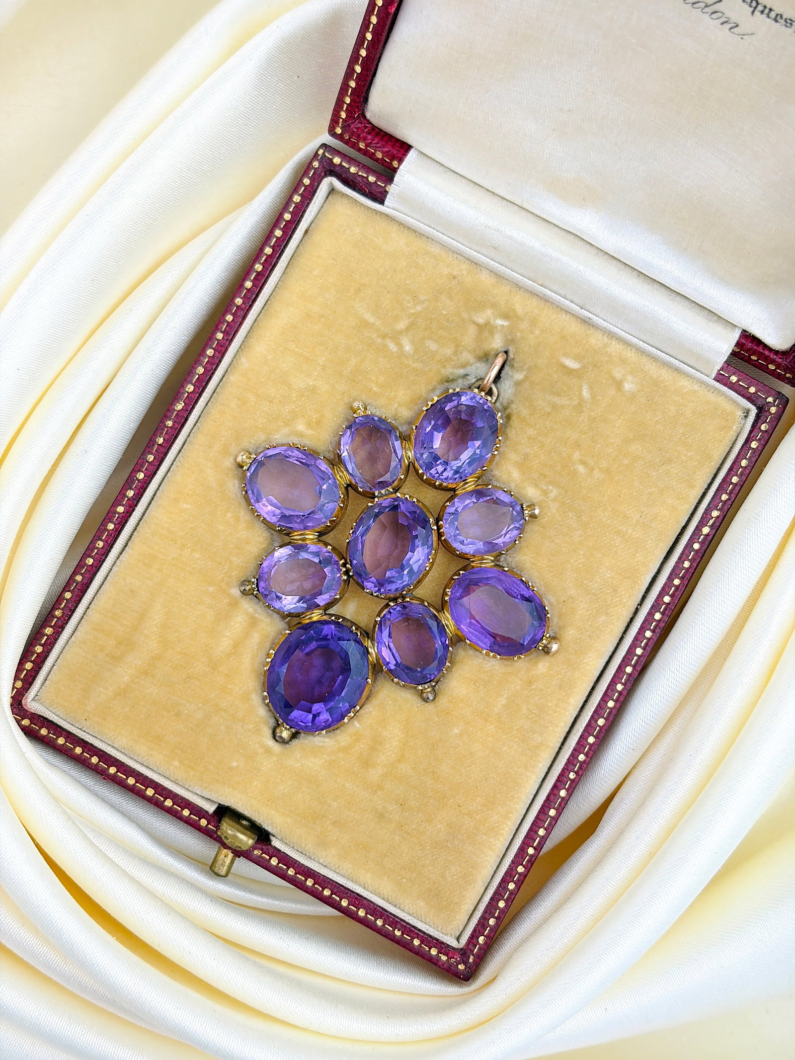 ANTIQUE VICTORIAN LARGE GOLD AMETHYST PENDANT IN ORIGINAL FITTED BOX: ANTIQUE VICTORIAN GOLD AMETHYST FLORAL PENDANT IN ORIGINAL FITTED BOX A truly exquisite pendant from the Victorian era made up of stunning pale amethyst stones. And in its original fitted box!!