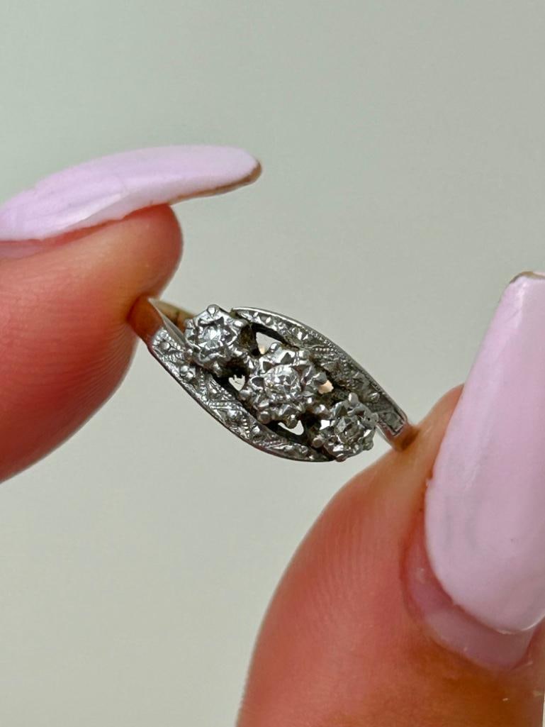 9ct Yellow Gold and Platinum Diamond 3 Stone Twist Ring: 9ct Yellow Gold and Platinum Diamond 3 Stone Twist Ring sweet diamond twist ring measurements size UK M US 61/2 head of ring 12mm x 7mm weight 2.67g stam