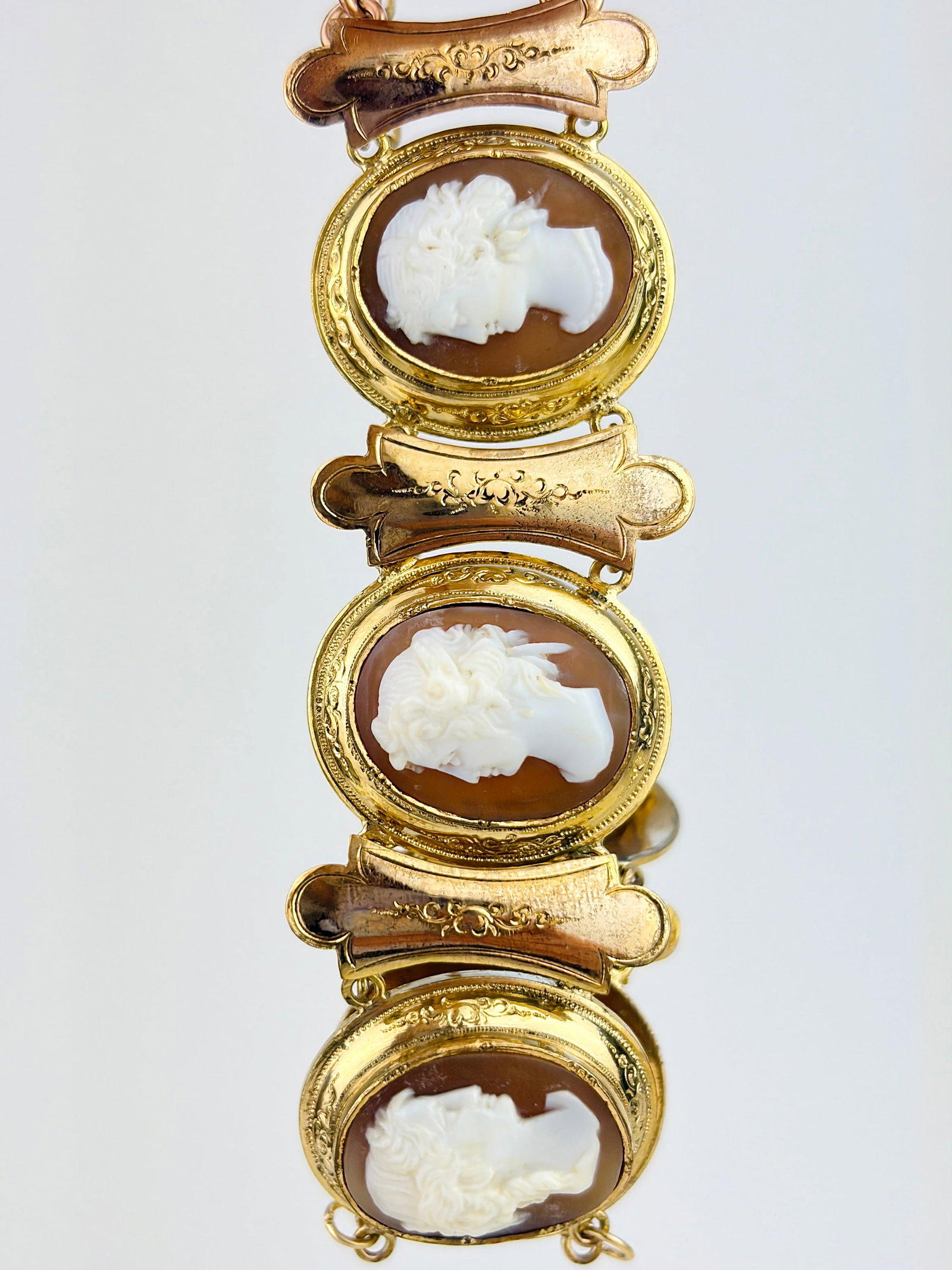 ANTIQUE LARGE GILT METAL CAMEO BRACELET WITH SAFETY CHAIN: ANTIQUE LARGE GILT METAL CAMEO BRACELET WITH SAFETY CHAIN A wonderful unique bracelet!
