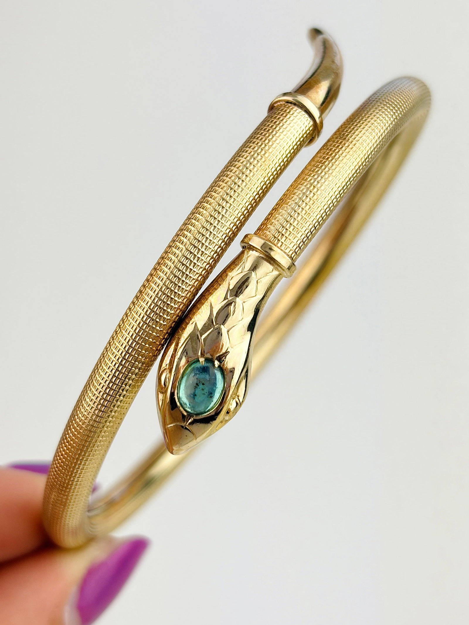 VINTAGE COILED SNAKE BANGLE WITH BLUE FOILED PASTE HEAD IN ROLLED GOLD: VINTAGE COILED SNAKE BANGLE WITH BLUE FOILED PASTE HEAD IN ROLLED GOLD Beautiful coiled snake bangle with gorgeous details!