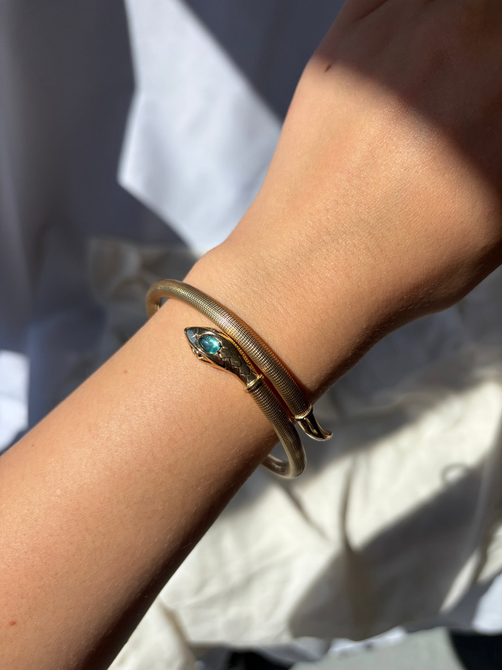 VINTAGE COILED SNAKE BANGLE WITH BLUE FOILED PASTE HEAD IN ROLLED GOLD - 6