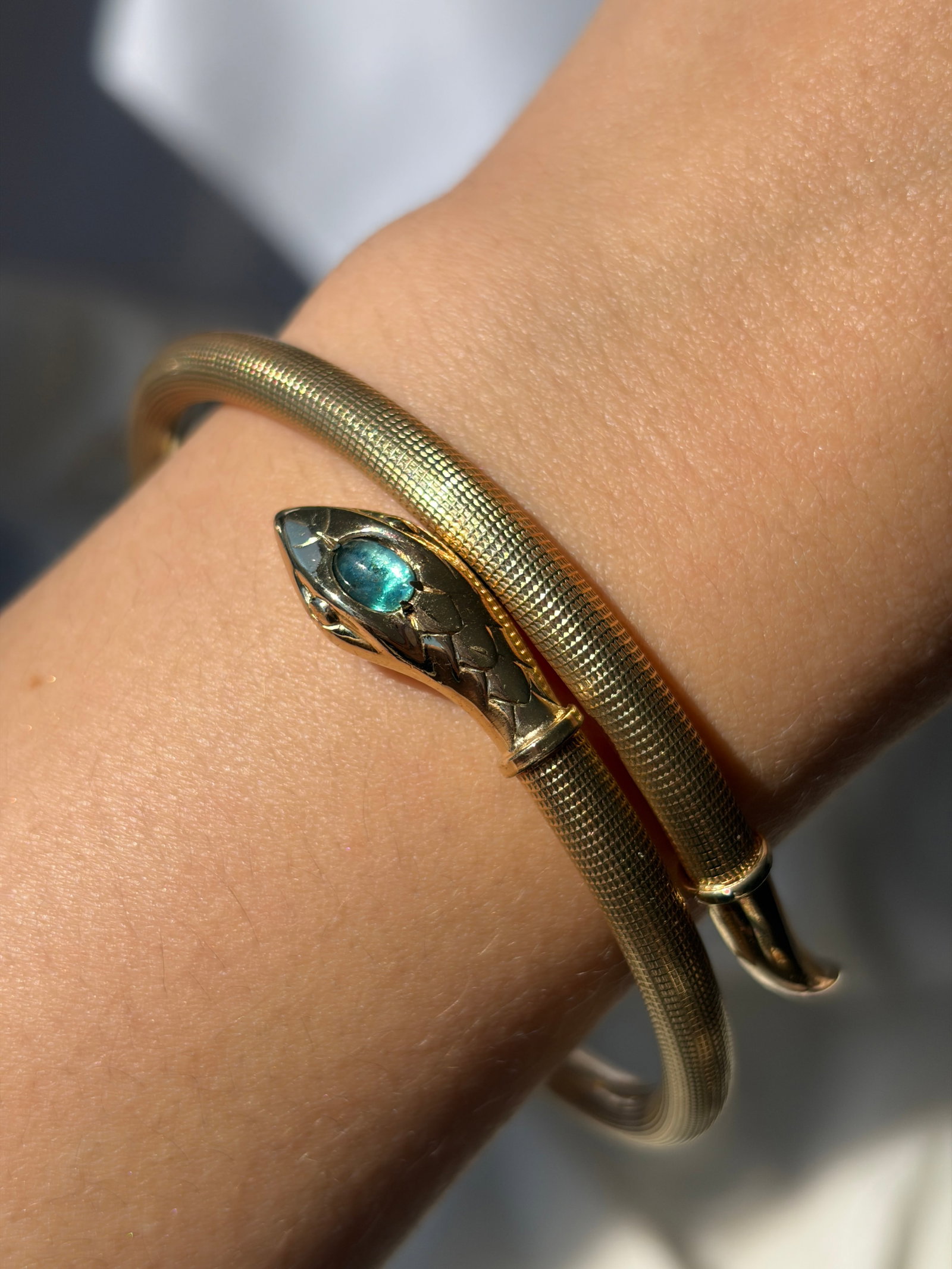 VINTAGE COILED SNAKE BANGLE WITH BLUE FOILED PASTE HEAD IN ROLLED GOLD - 7