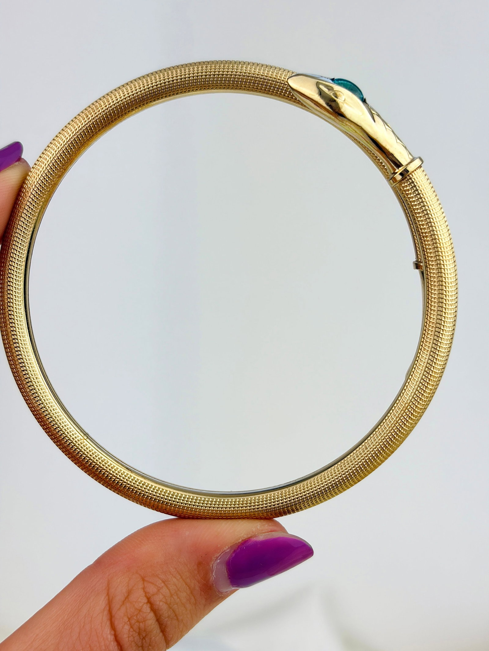 VINTAGE COILED SNAKE BANGLE WITH BLUE FOILED PASTE HEAD IN ROLLED GOLD - 8