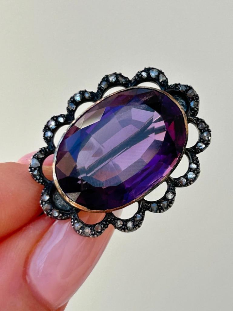 Chunky Antique 19ct Amethyst and Rose Cut Diamond Pretty Brooch in Gold: Chunky Antique 19ct Amethyst and Rose Cut Diamond Pretty Brooch in Gold the most amazing amethyst brooch with sweet diamonds surrounding measurements size 35mm x 23mm weight 8.52g 