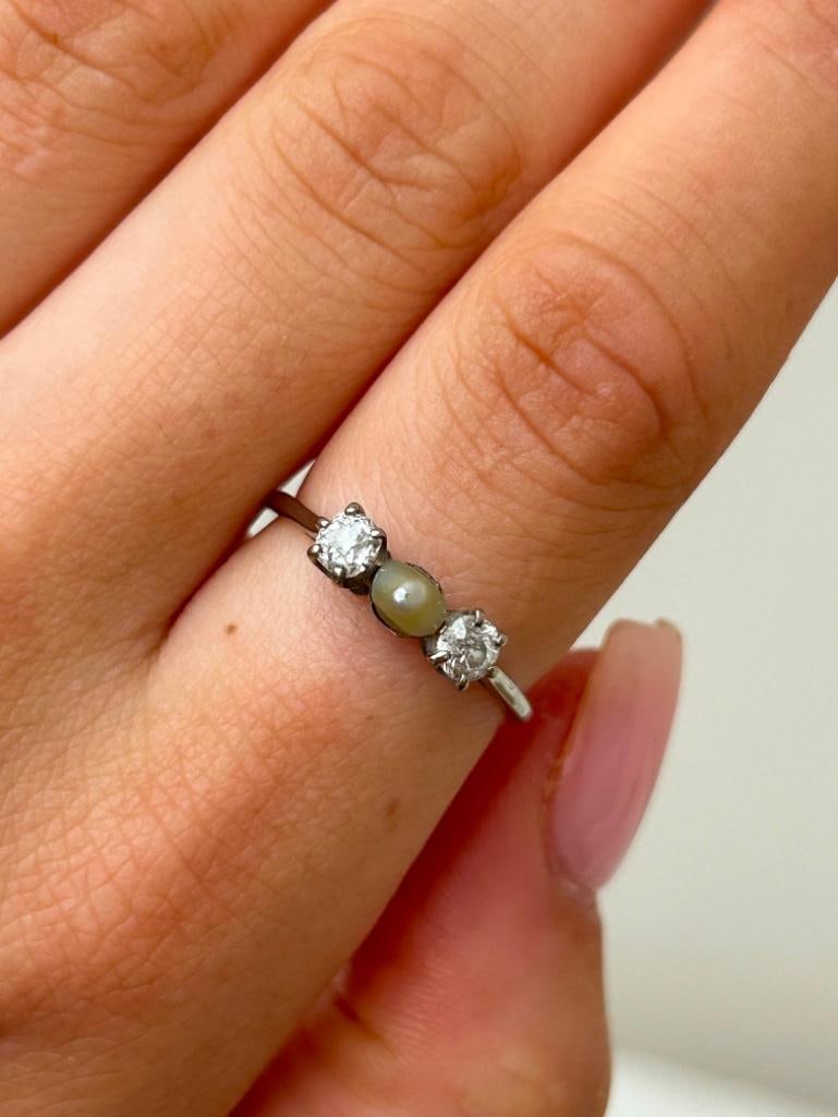 Antique White Gold Pearl and Diamond 3 Stone Ring: Antique White Gold Pearl and Diamond 3 Stone Ring truly sweet and pretty measurements size UK P US 8 head of ring 12mm x 4mm weight 2.10g materials